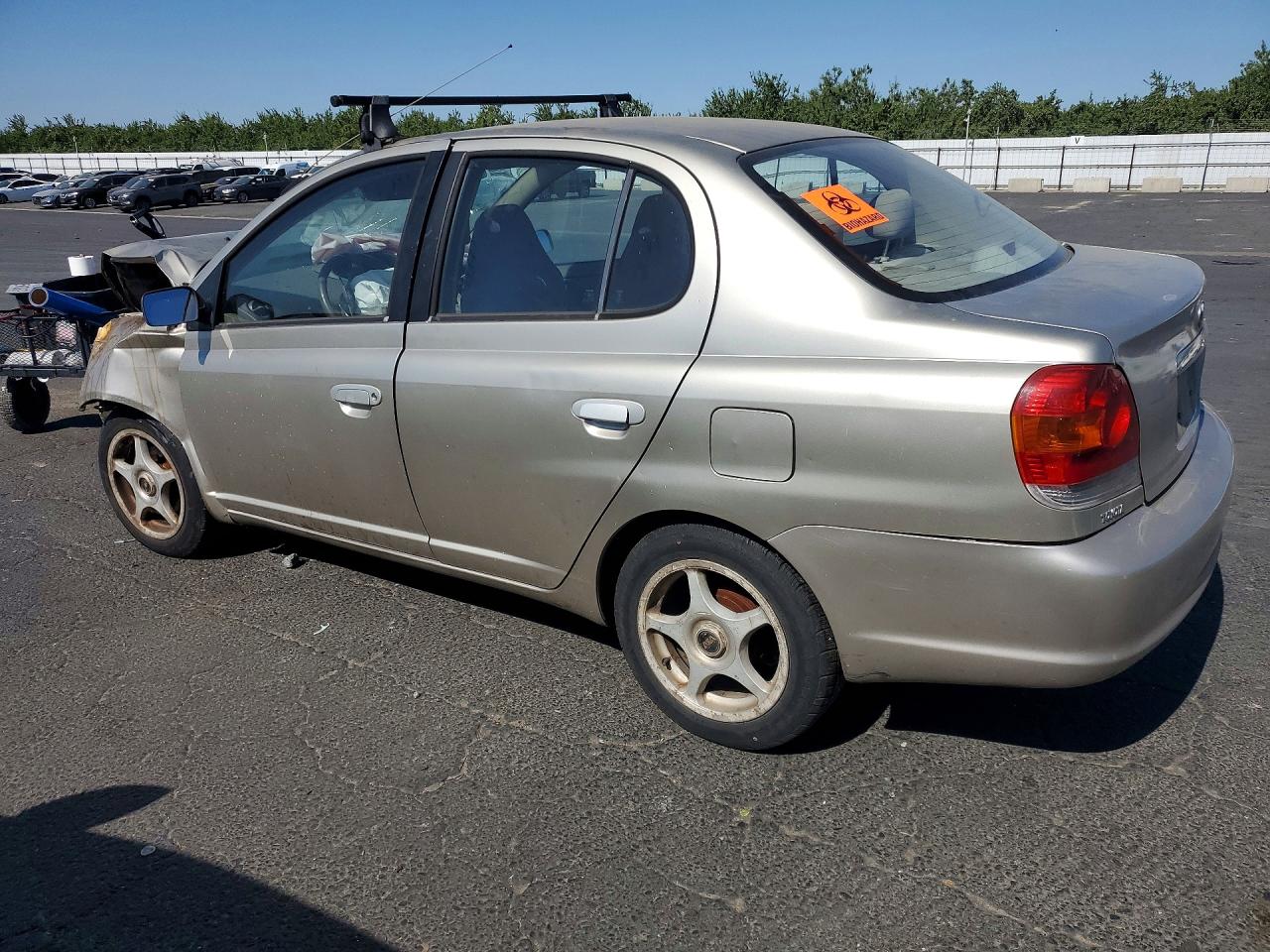 2003 Toyota Echo Base Tan vin: JTDBT123630259965