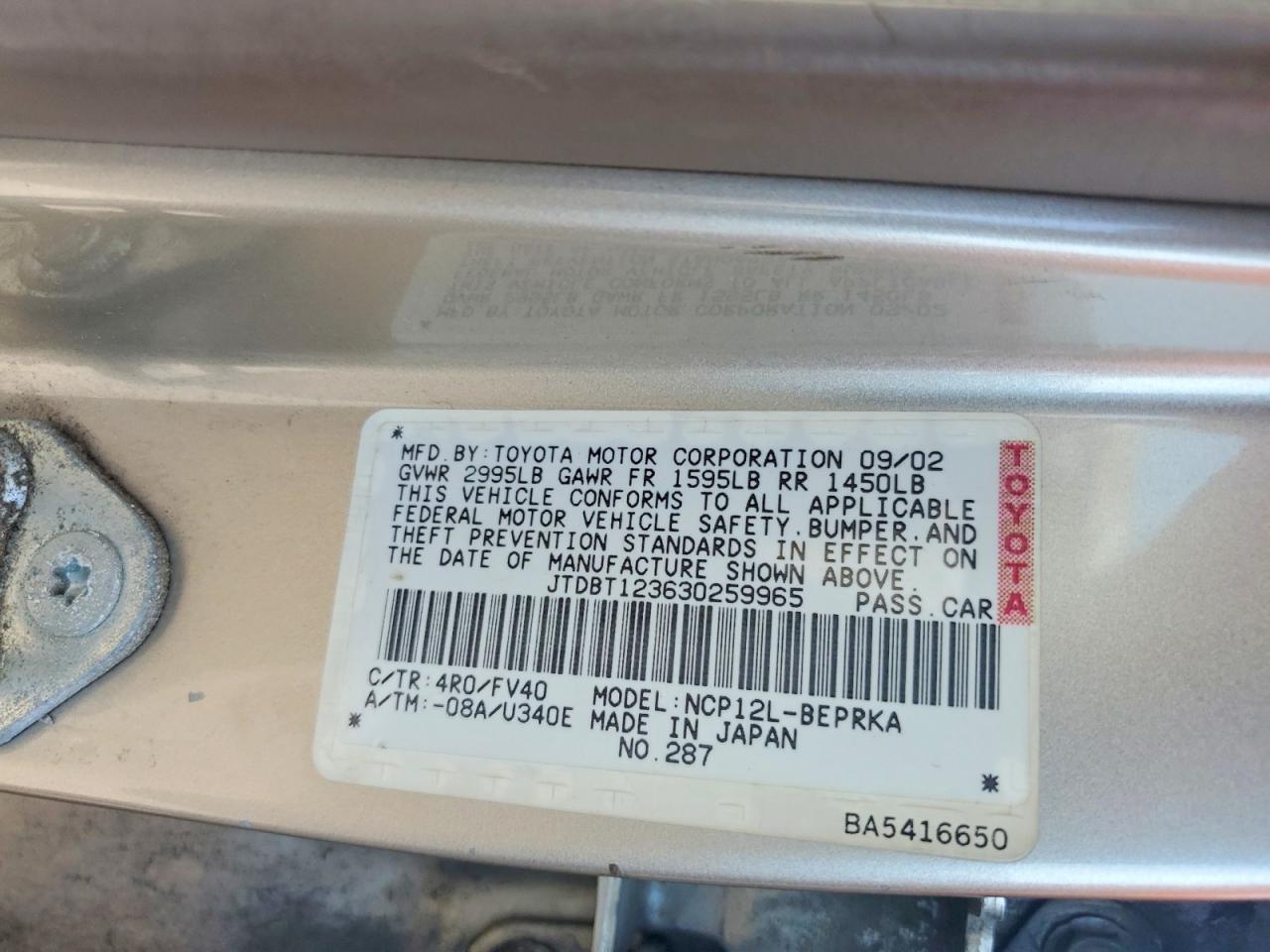 2003 Toyota Echo Base Tan vin: JTDBT123630259965