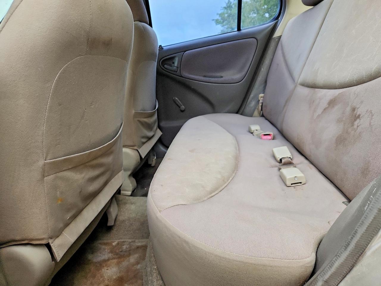 2003 Toyota Echo Base Tan vin: JTDBT123X30278082