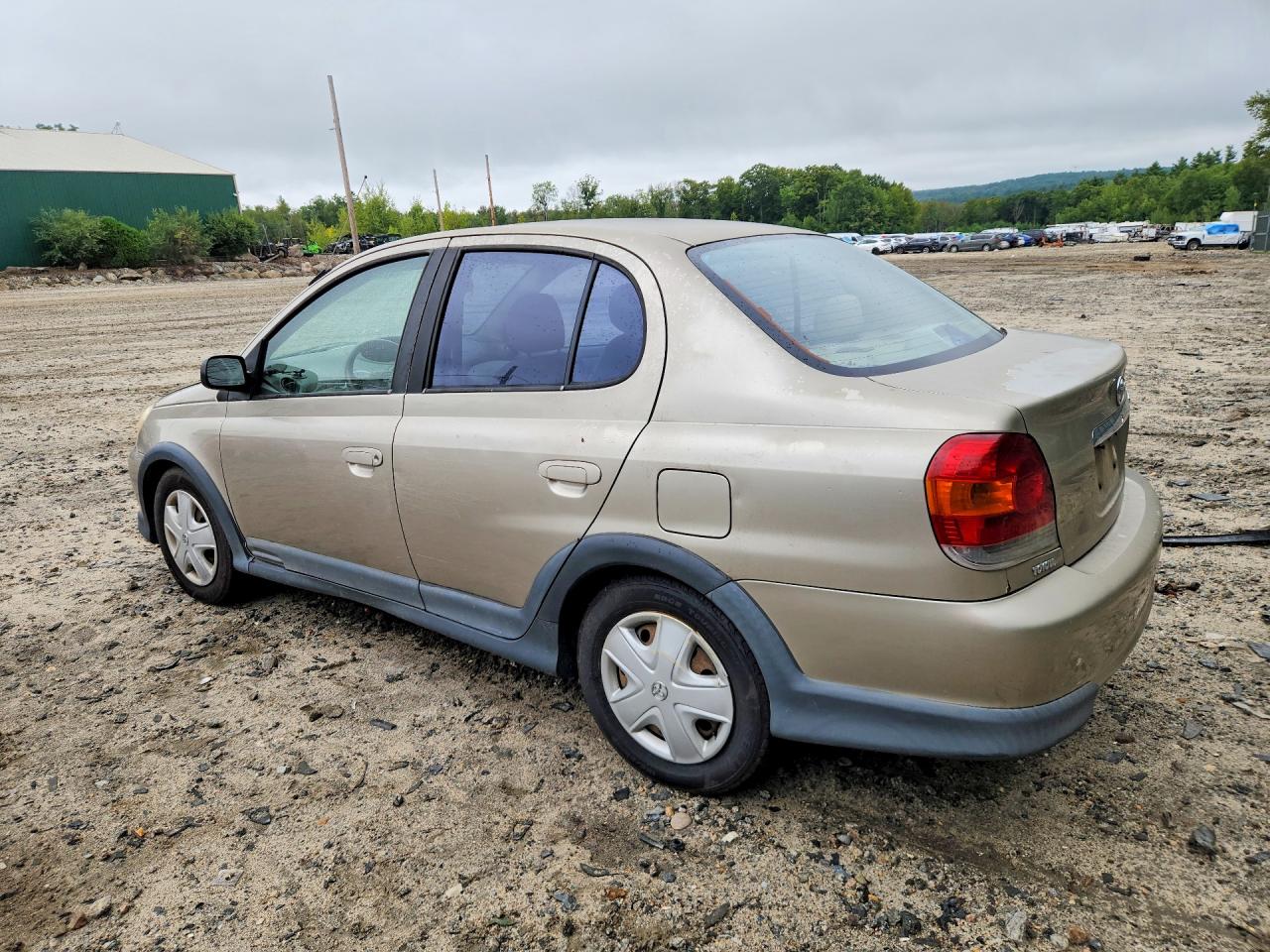 2003 Toyota Echo Base Tan vin: JTDBT123X30278082