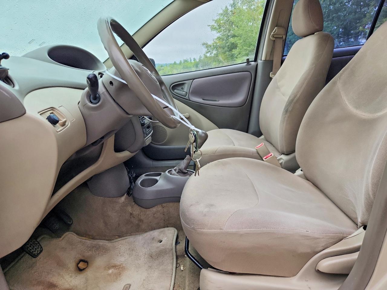 2003 Toyota Echo Base Tan vin: JTDBT123X30278082