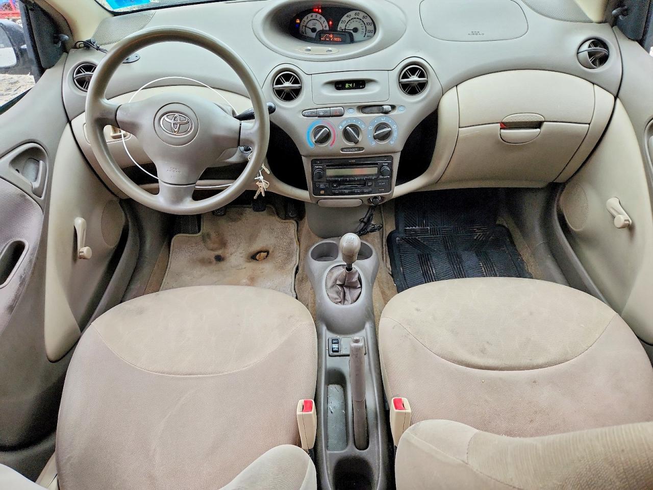2003 Toyota Echo Base Tan vin: JTDBT123X30278082