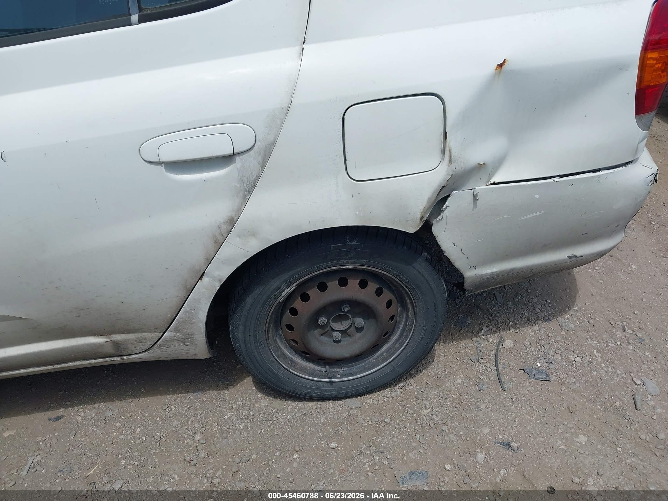 2003 Toyota Echo   Белый vin: JTDBT123X35045127