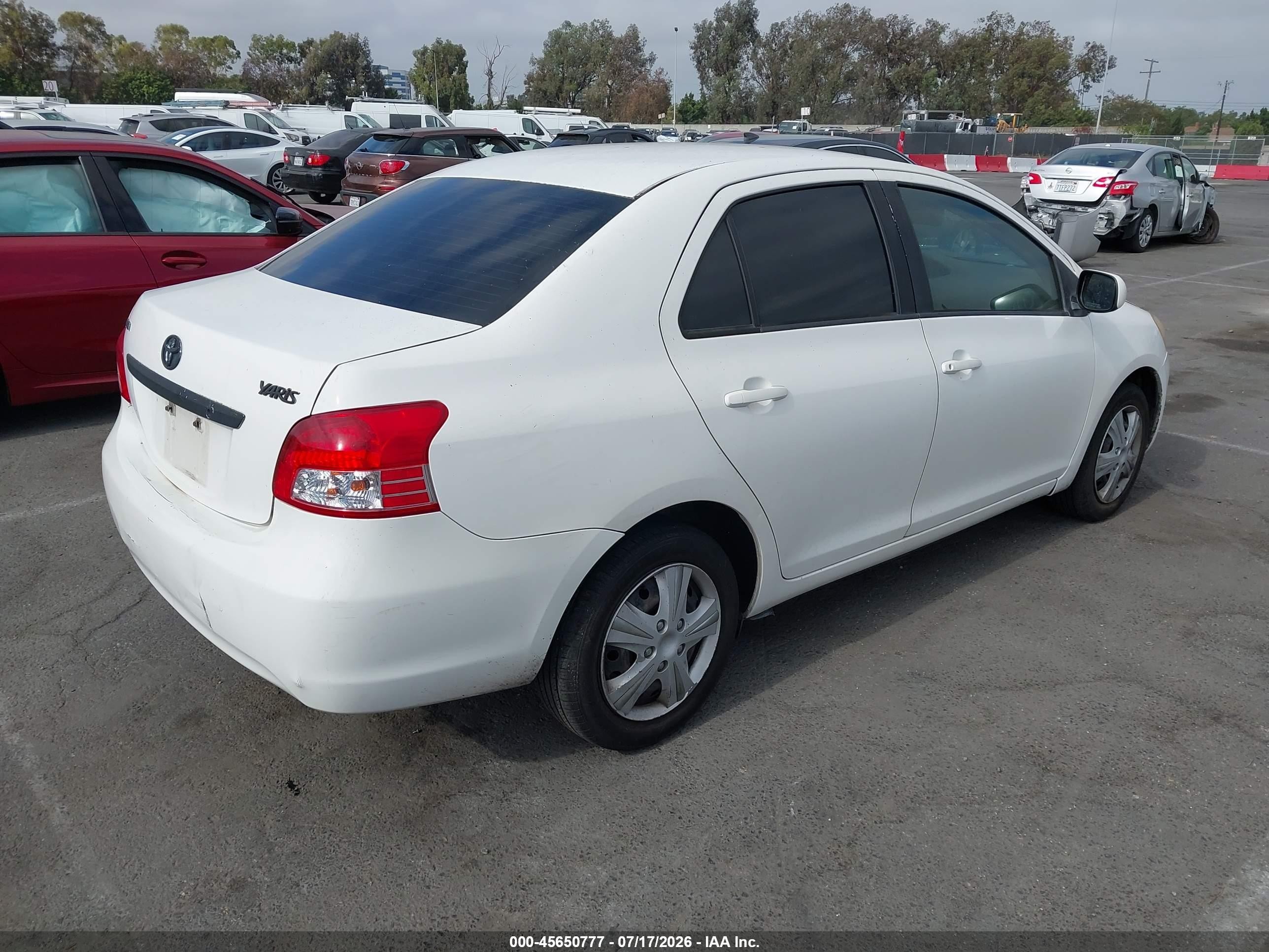 2010 Toyota Yaris   White vin: JTDBT4K30A1354630