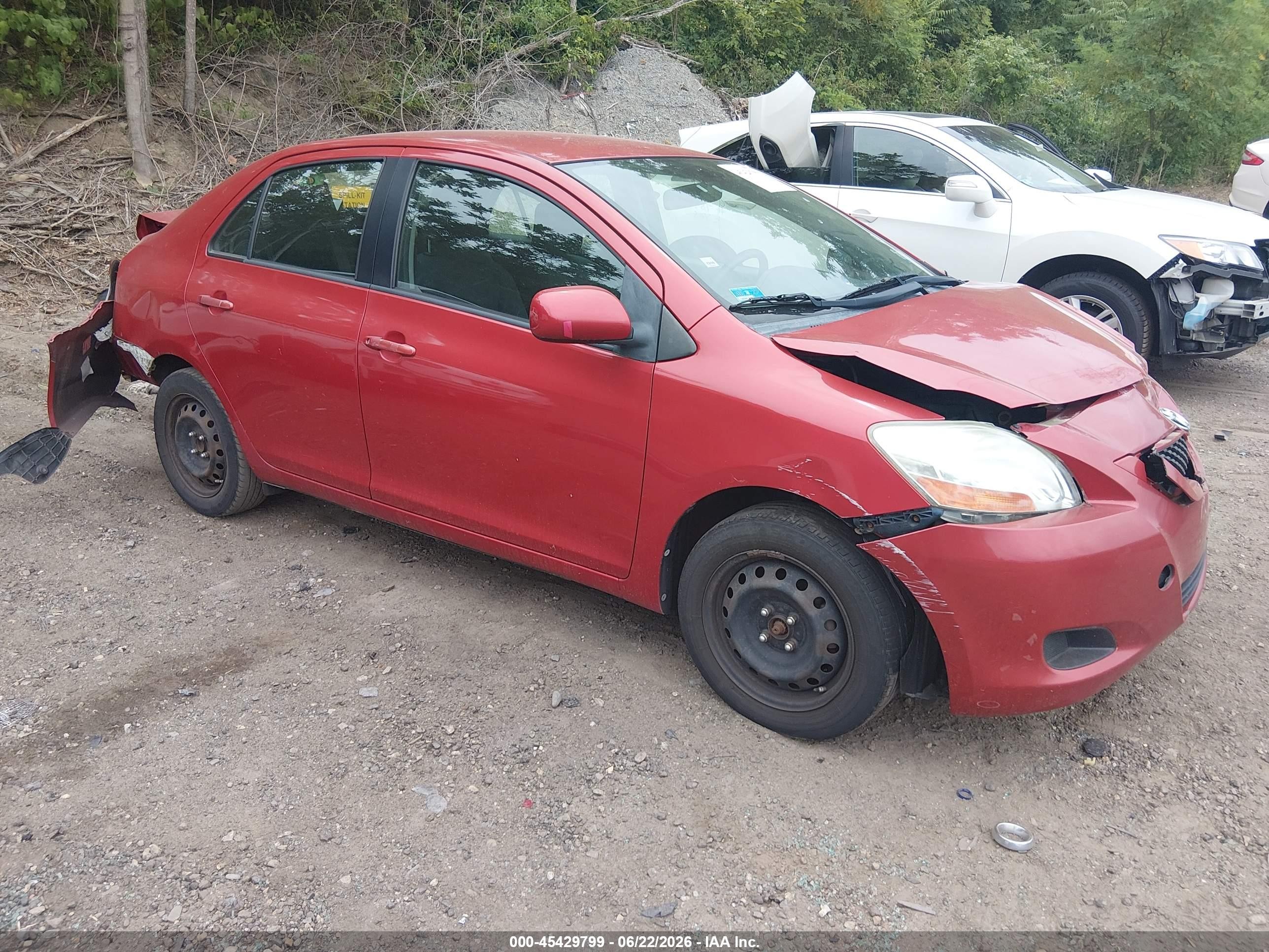 2010 Toyota Yaris   Red vin: JTDBT4K30A1361920