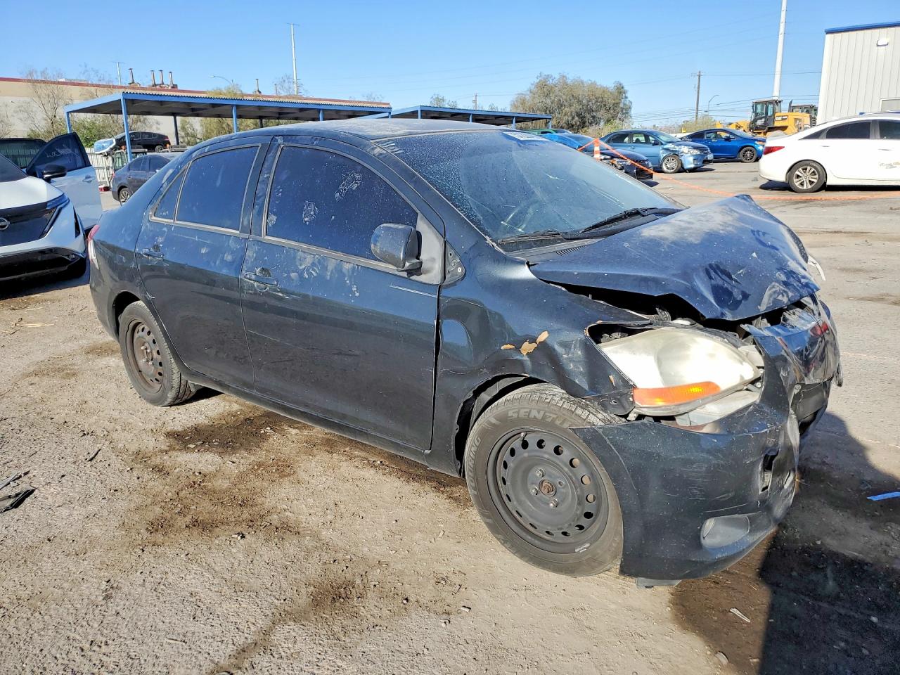 2010 Toyota Yaris Base Серый vin: JTDBT4K30A4063768