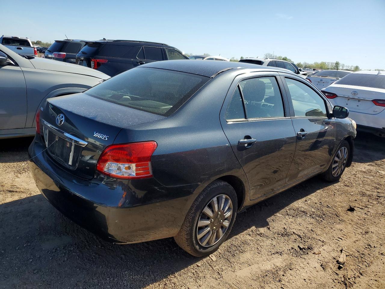 2011 Toyota Yaris Base Gray vin: JTDBT4K30B1406243