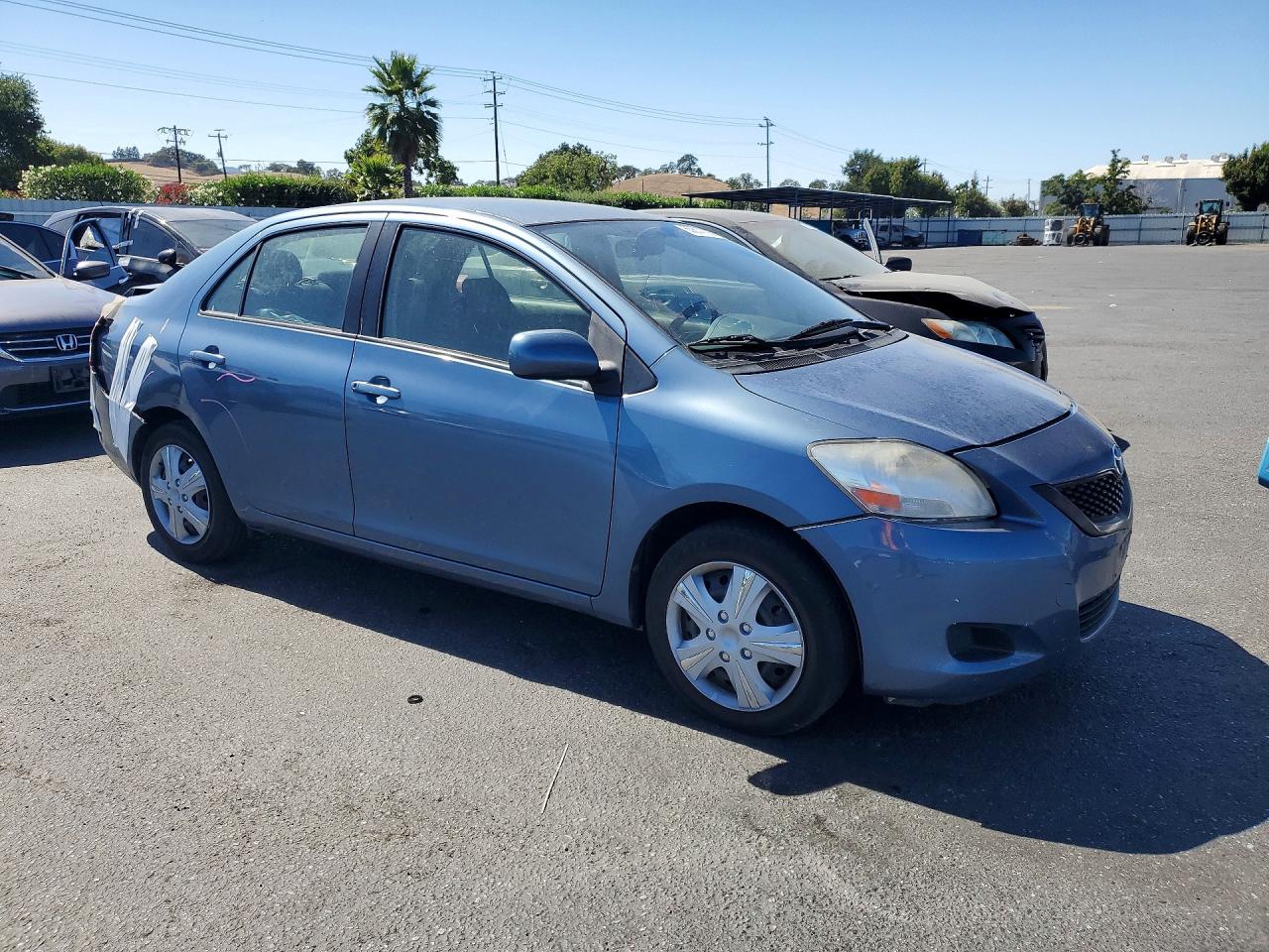 2012 Toyota Yaris Fleet Blue vin: JTDBT4K30CL023747
