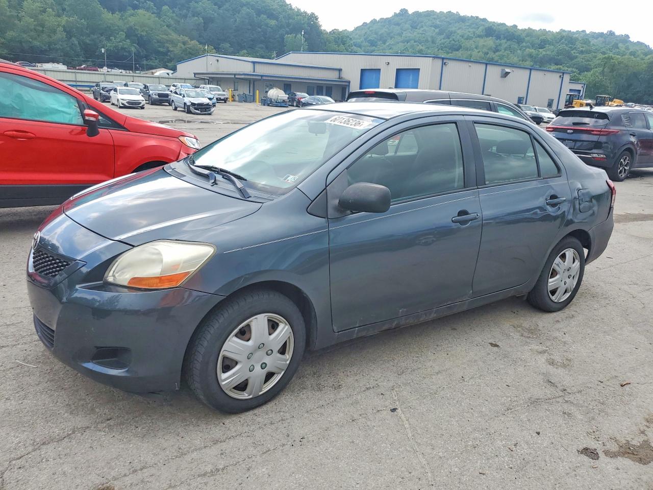 2010 Toyota Yaris Base Blue vin: JTDBT4K31A1373770
