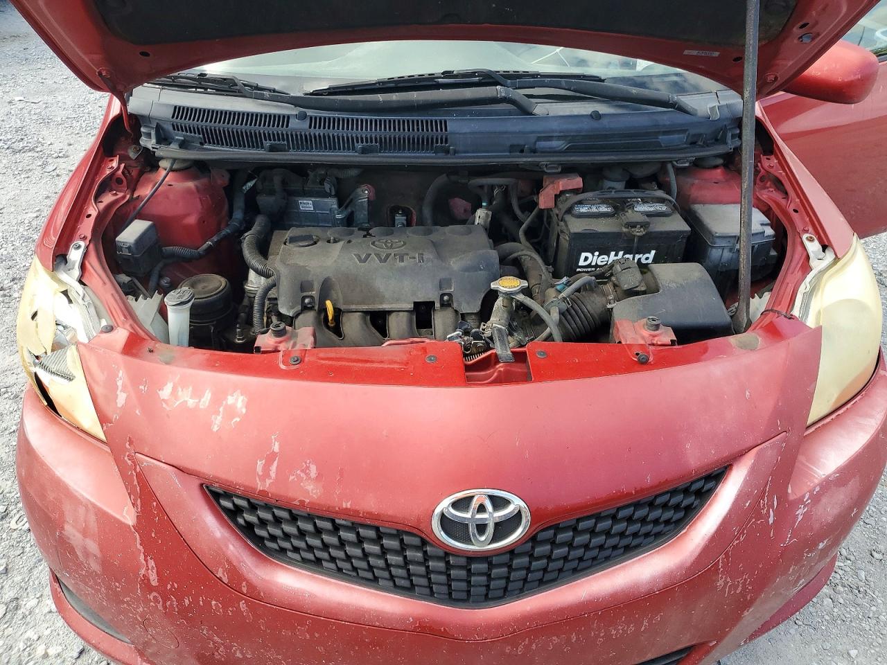 2011 Toyota Yaris Base Red vin: JTDBT4K31B1408292