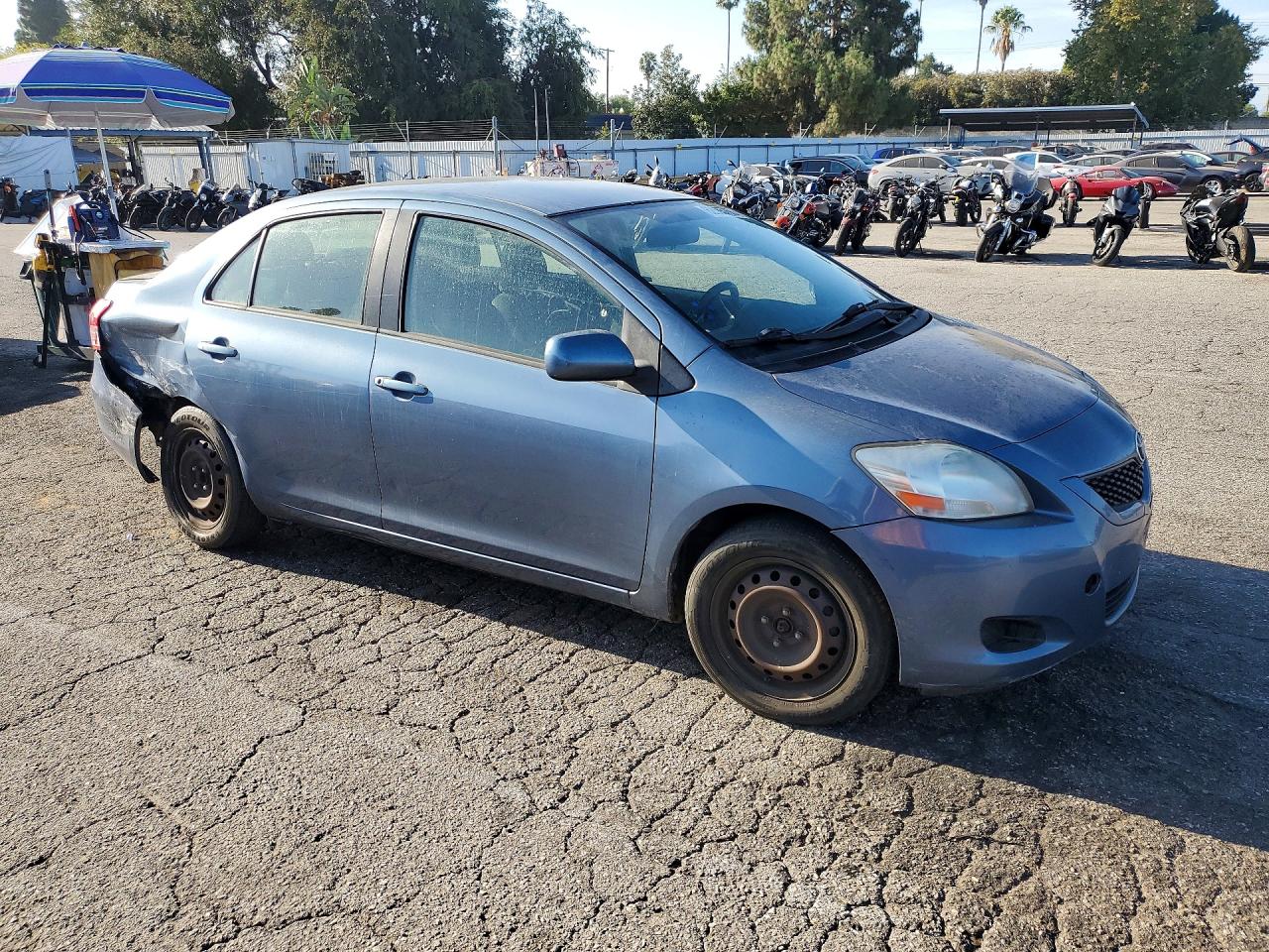 2012 Toyota Yaris Fleet Blue vin: JTDBT4K31CL016855