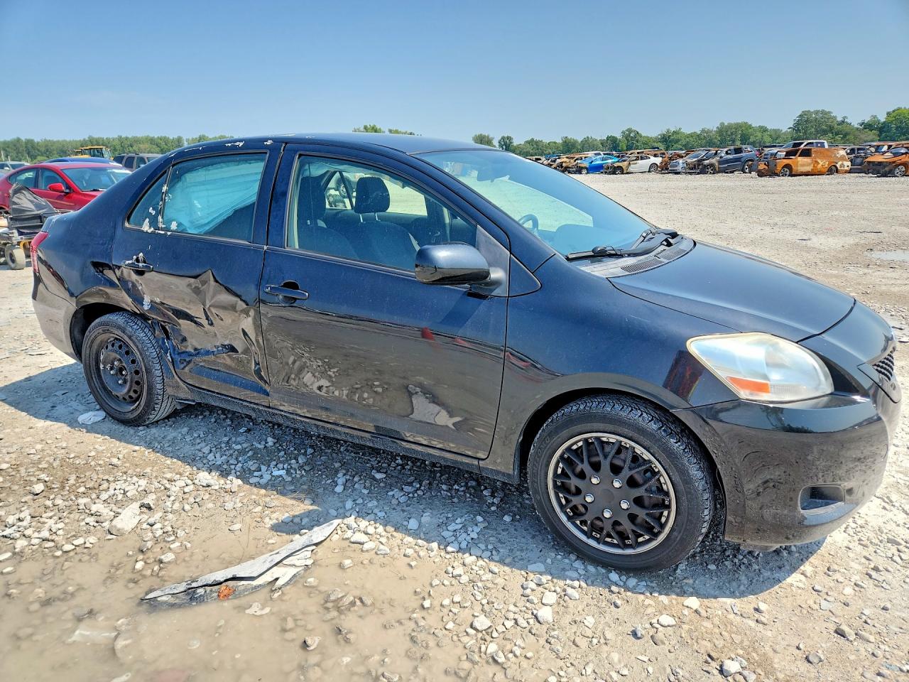 2012 Toyota Yaris Fleet Black vin: JTDBT4K32CL016329