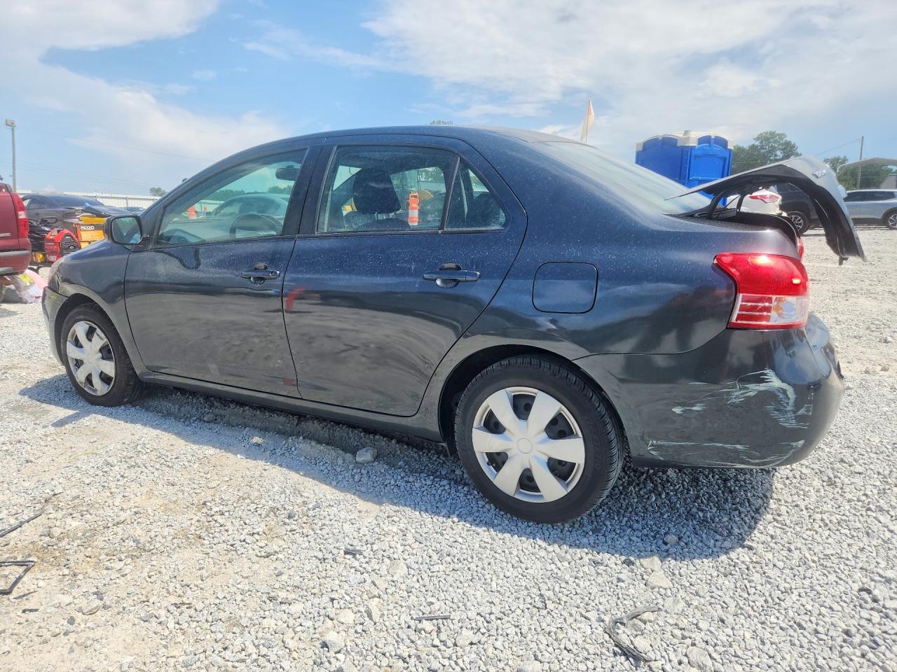 2010 Toyota Yaris Base Серый vin: JTDBT4K33A1352368