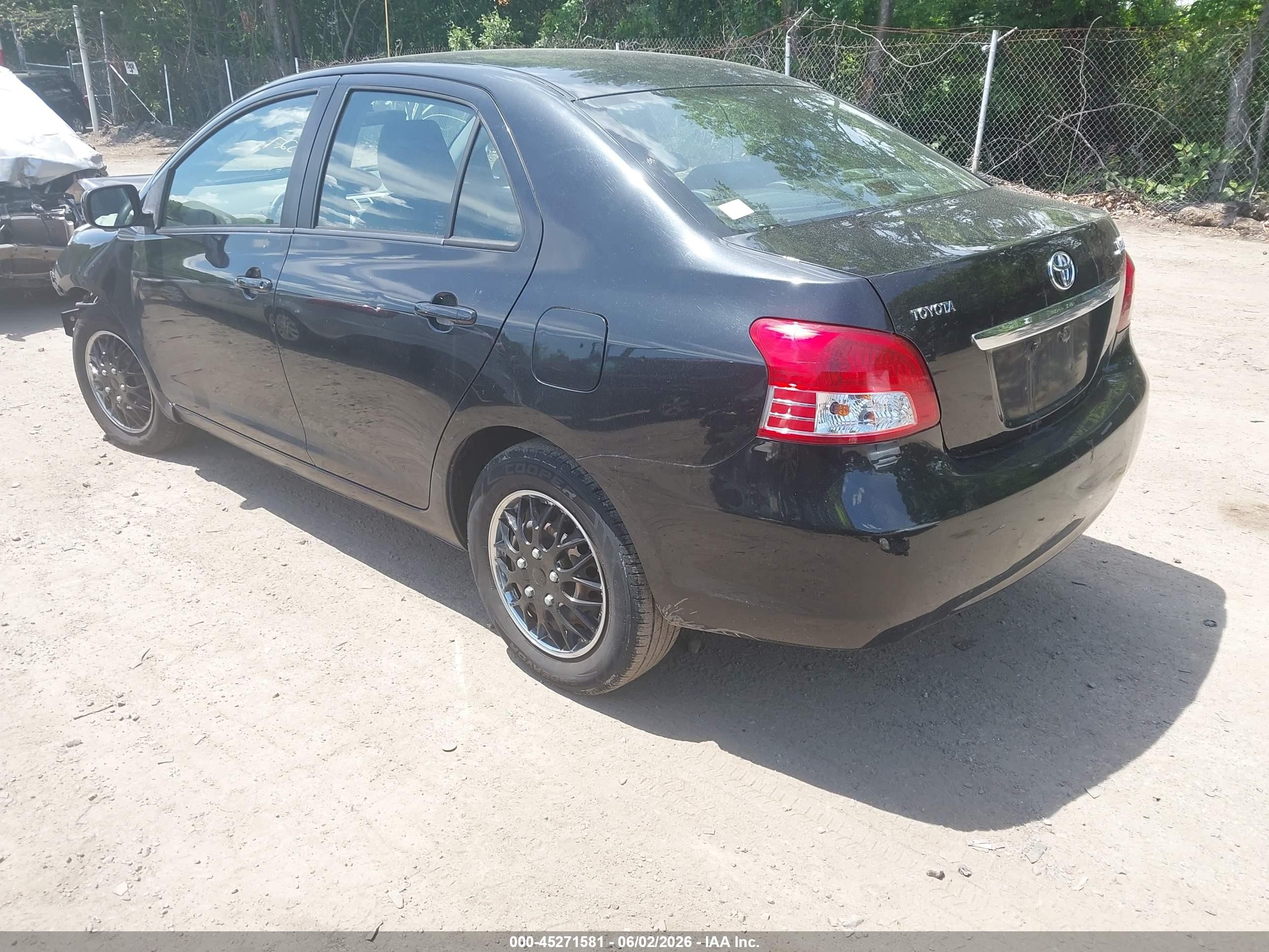 2010 Toyota Yaris Black vin: JTDBT4K33A1369459