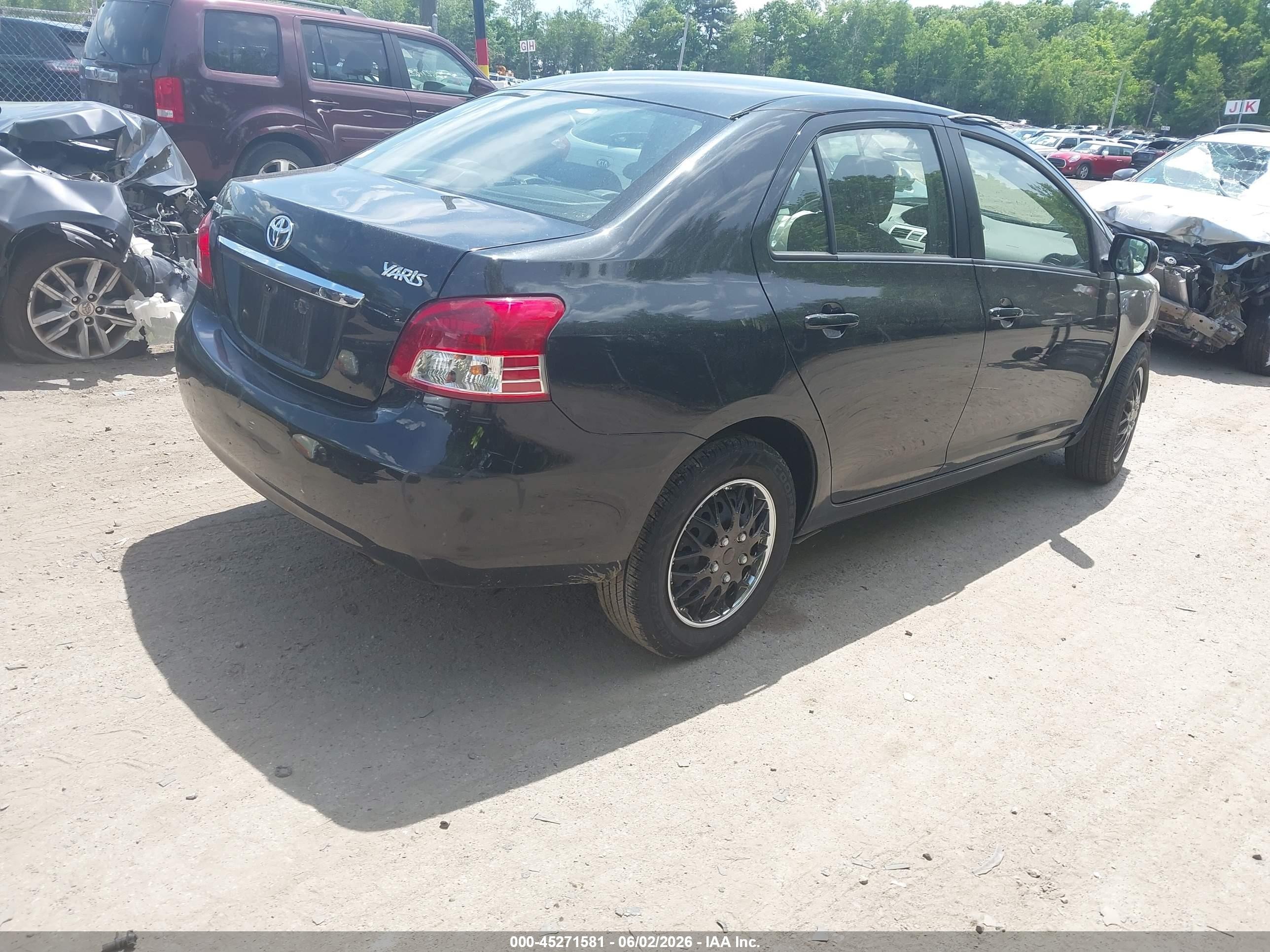 2010 Toyota Yaris Black vin: JTDBT4K33A1369459