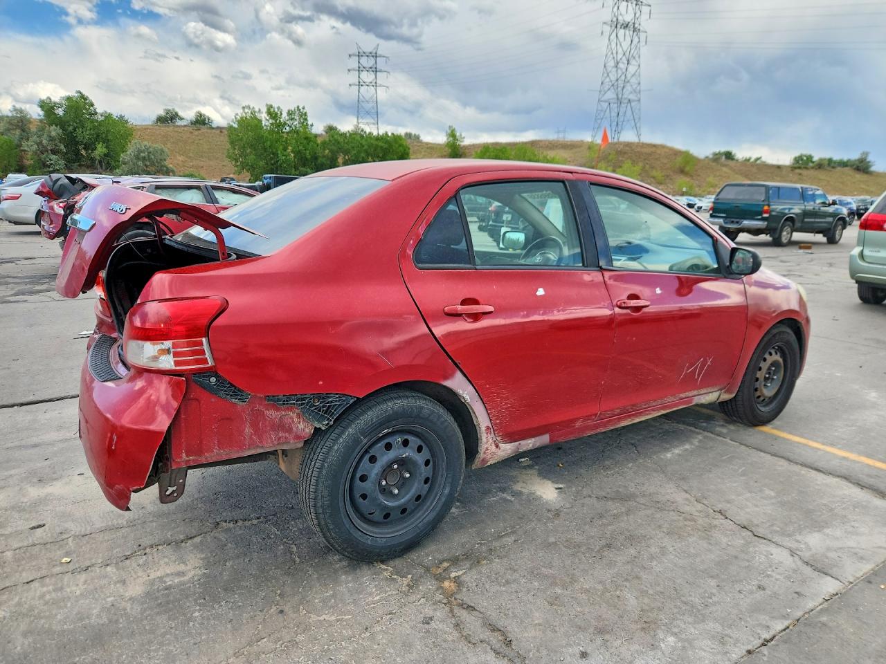 2010 Toyota Yaris Base Red vin: JTDBT4K34A1379692