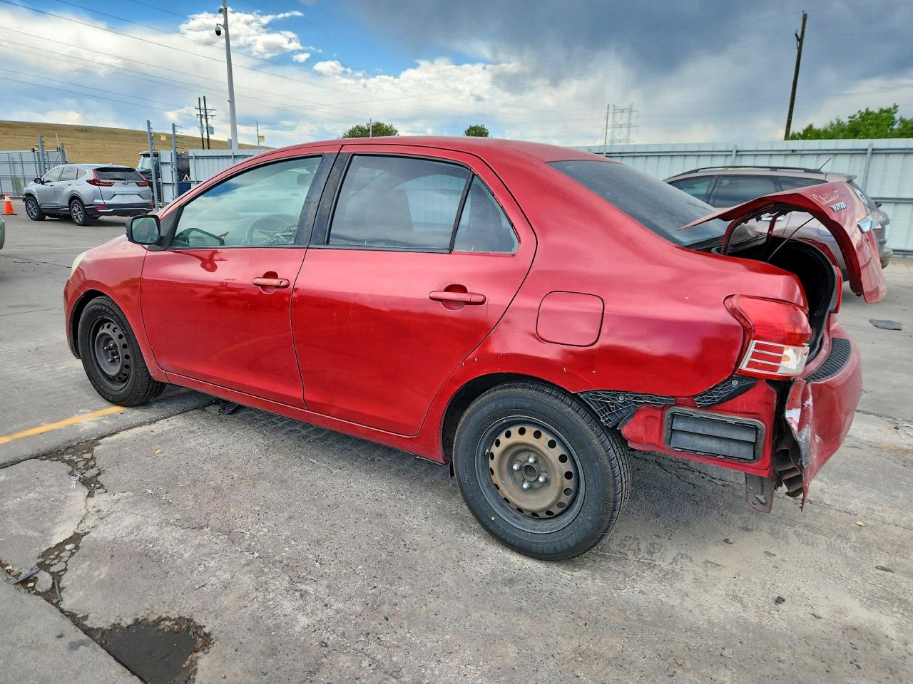 2010 Toyota Yaris Base Red vin: JTDBT4K34A1379692