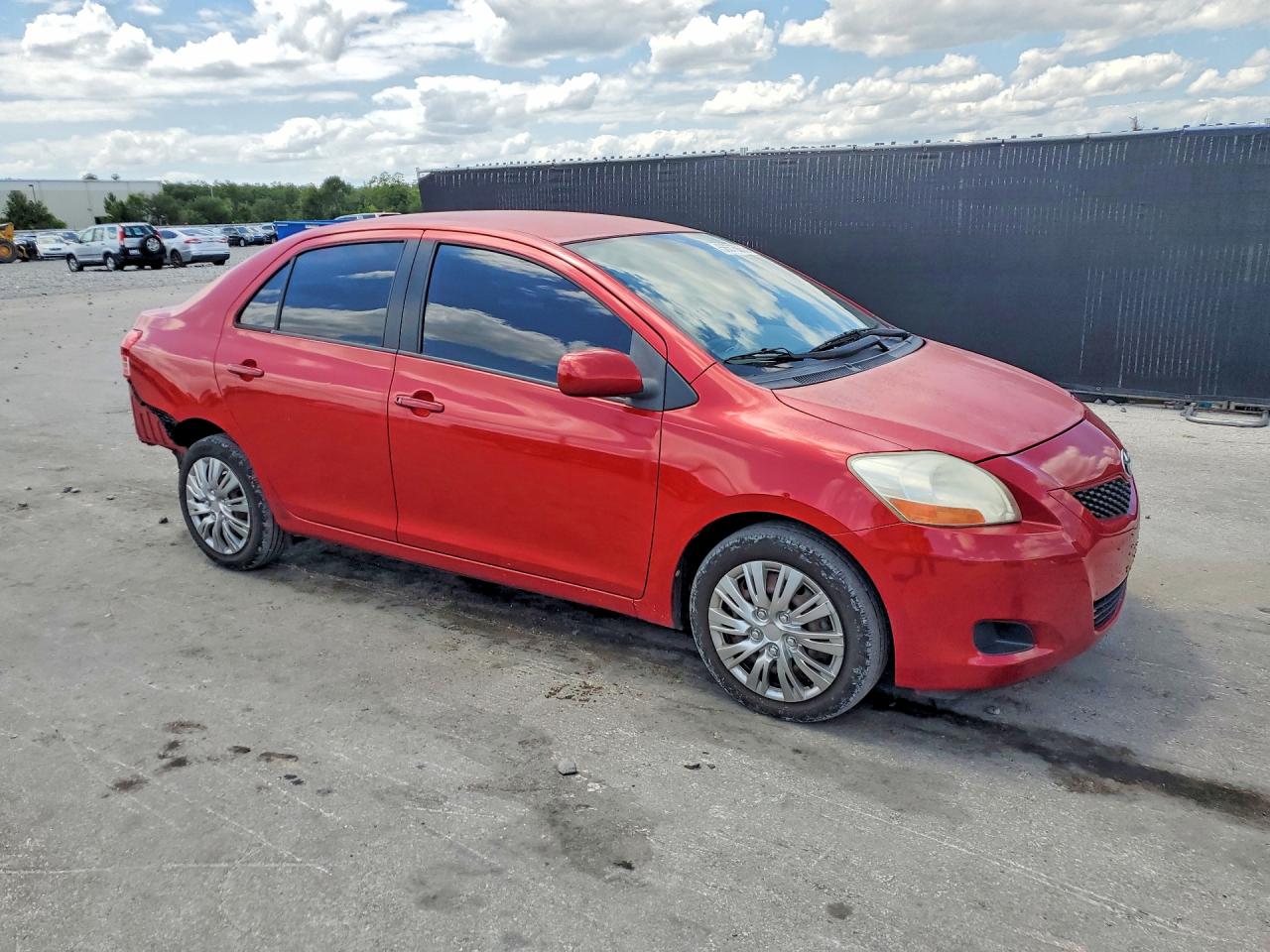 2010 Toyota Yaris Base Red vin: JTDBT4K35A1370287