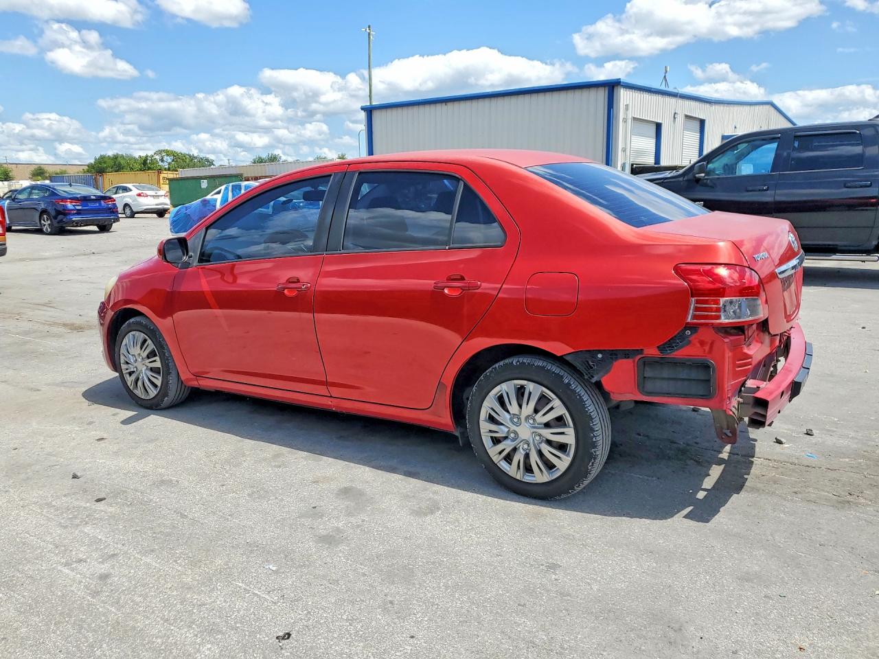2010 Toyota Yaris Base Red vin: JTDBT4K35A1370287