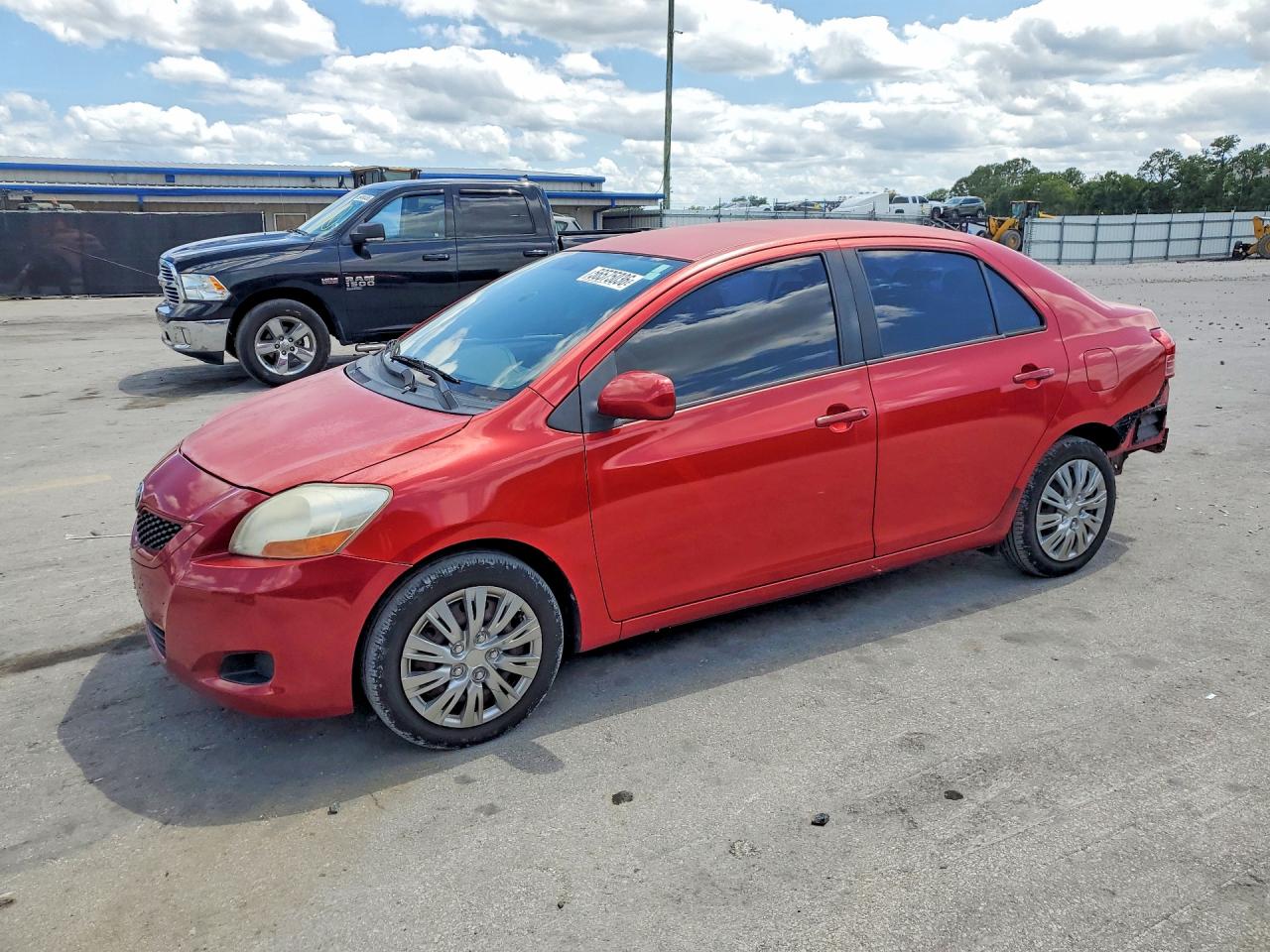 2010 Toyota Yaris Base Red vin: JTDBT4K35A1370287