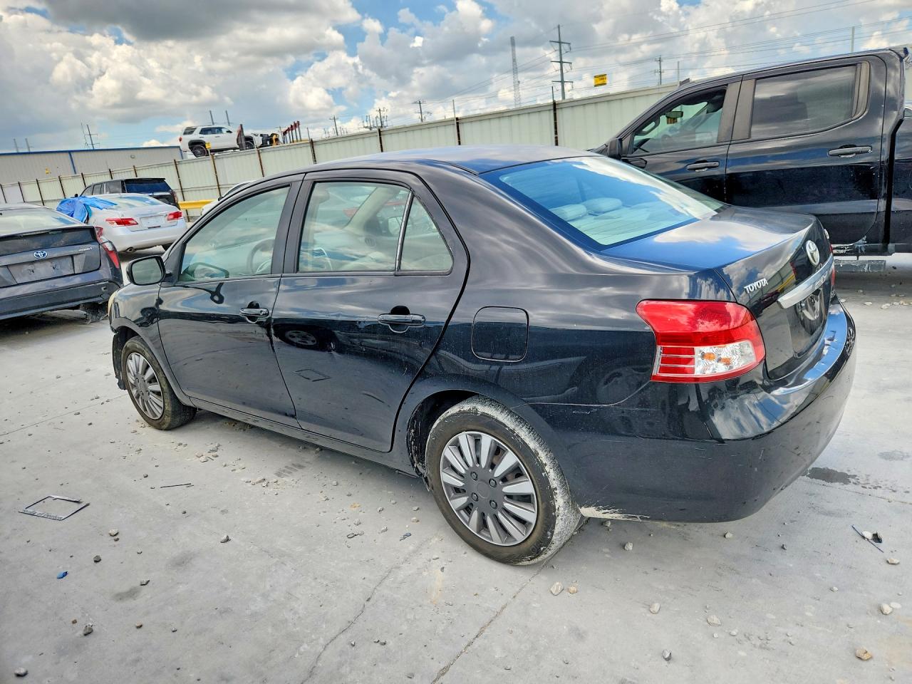2010 Toyota Yaris Base Black vin: JTDBT4K35A4063572