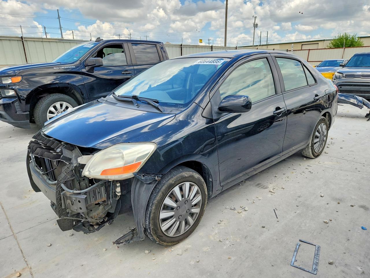 2010 Toyota Yaris Base Black vin: JTDBT4K35A4063572