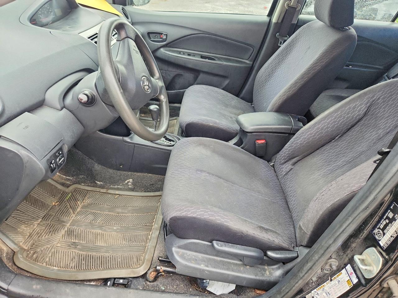2011 Toyota Yaris Base Black vin: JTDBT4K35B1412846