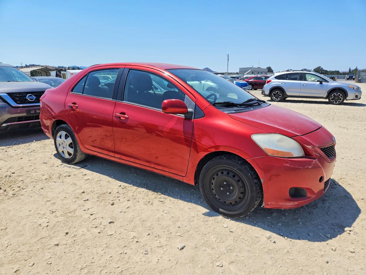 2011 Toyota Yaris Base Red vin: JTDBT4K36B1400558