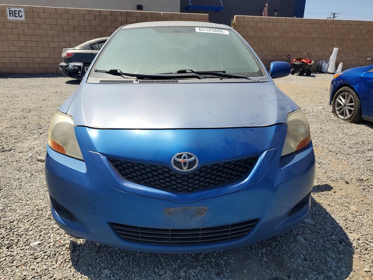 2010 Toyota Yaris Base Blue vin: JTDBT4K37A1374468