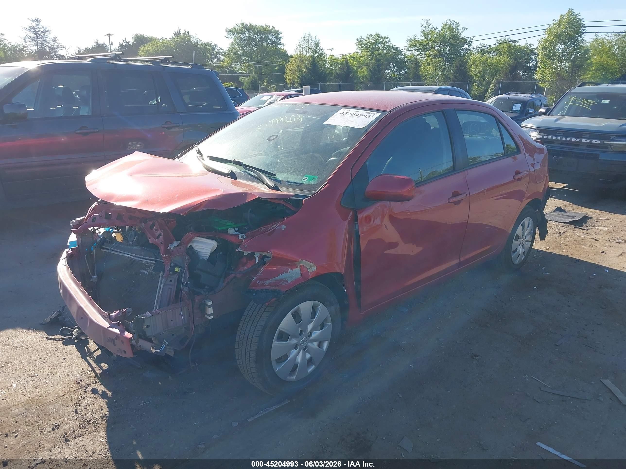 2010 Toyota Yaris   Red vin: JTDBT4K37A4063783