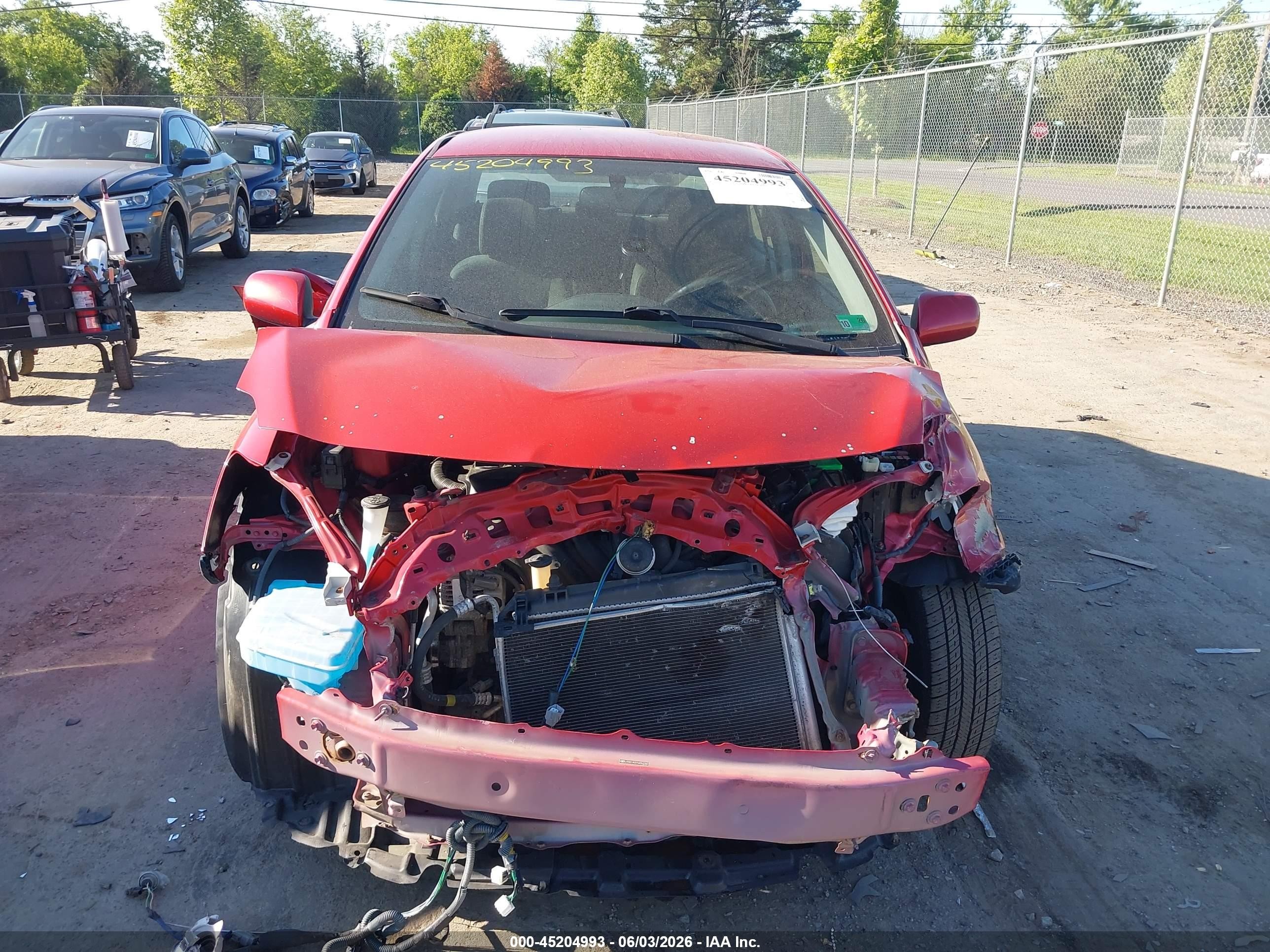 2010 Toyota Yaris   Red vin: JTDBT4K37A4063783