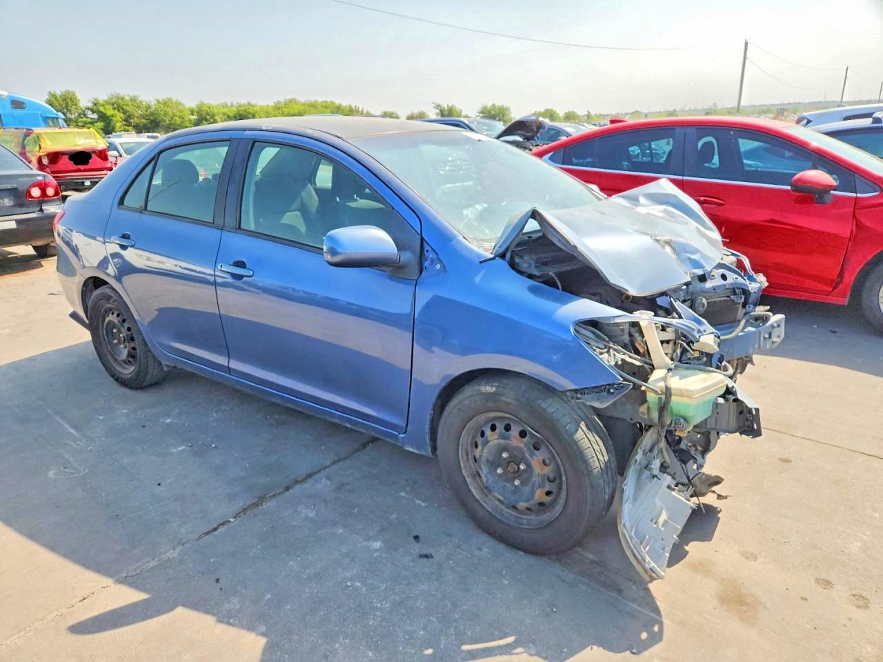 2012 Toyota Yaris Fleet Blue vin: JTDBT4K37C1418360
