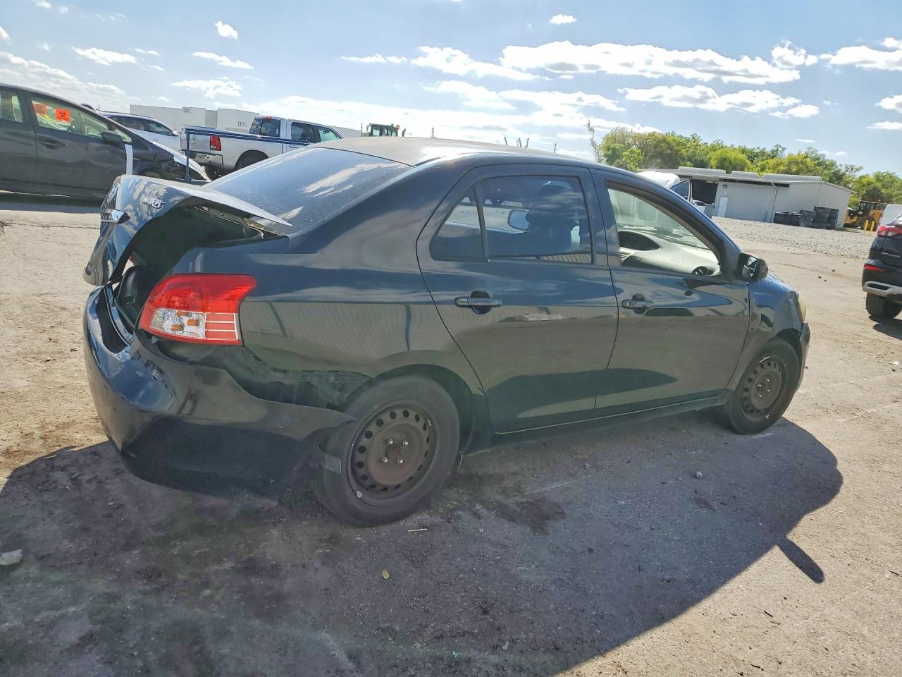 2012 Toyota Yaris Fleet Black vin: JTDBT4K37CL016746