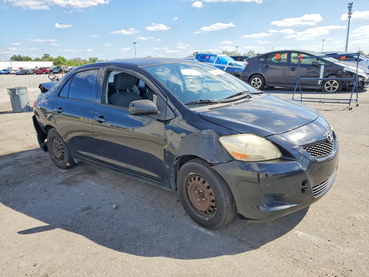 2012 Toyota Yaris Fleet Black vin: JTDBT4K37CL016746