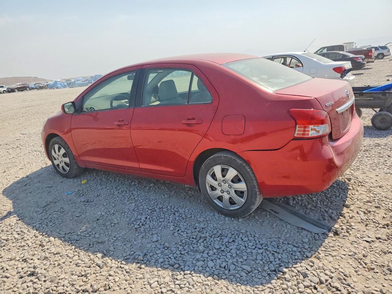 2010 Toyota Yaris Base Red vin: JTDBT4K38A4064537