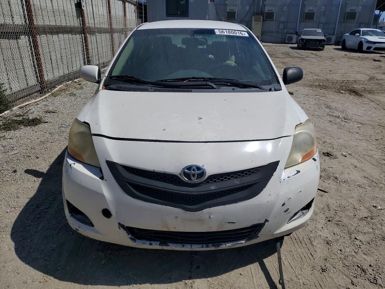 2010 Toyota Yaris Base White vin: JTDBT4K38A4066658