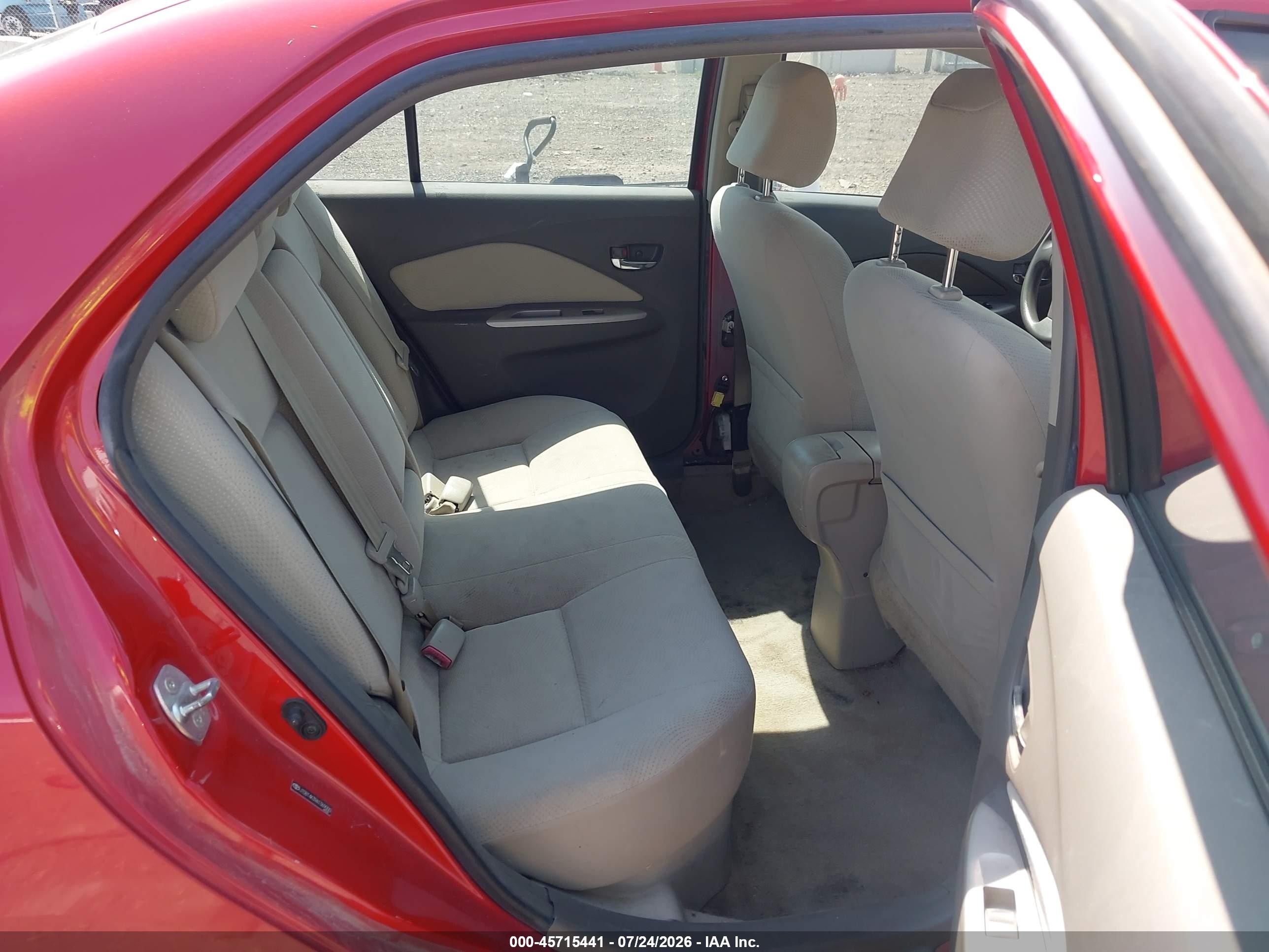 2010 Toyota Yaris   Red vin: JTDBT4K39A1369000