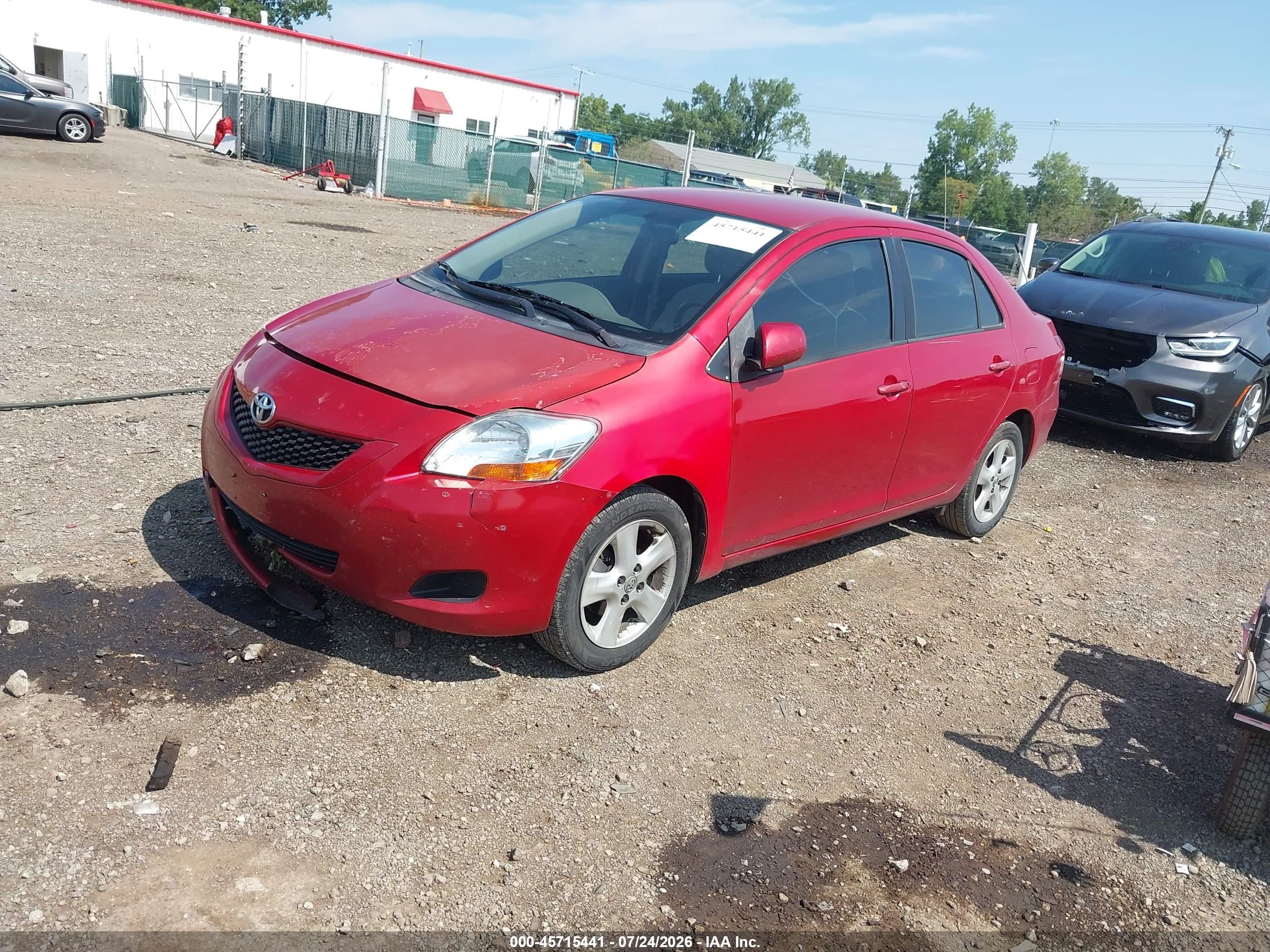 2010 Toyota Yaris   Red vin: JTDBT4K39A1369000