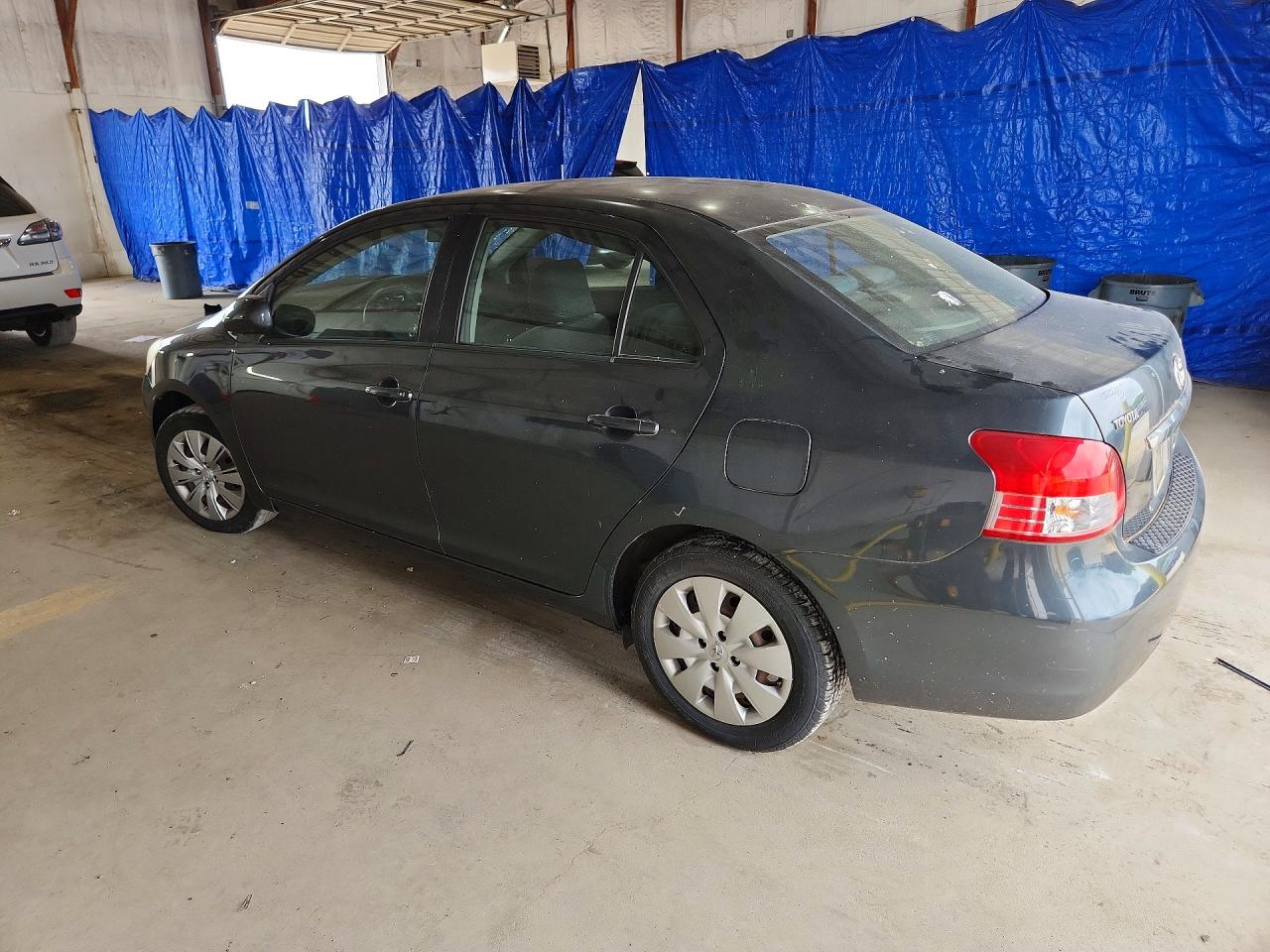 2010 Toyota Yaris Base Black vin: JTDBT4K39A4065812