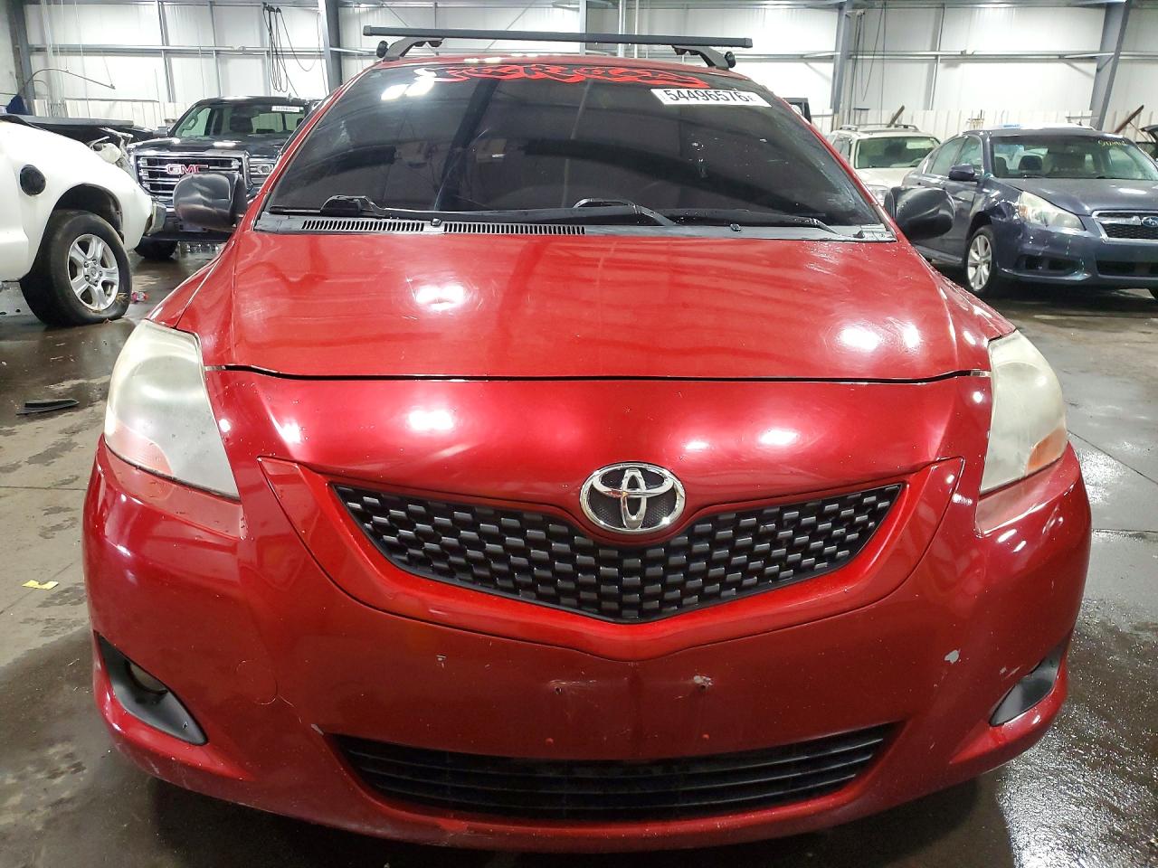2010 Toyota Yaris Base Red vin: JTDBT4K3XA1370754