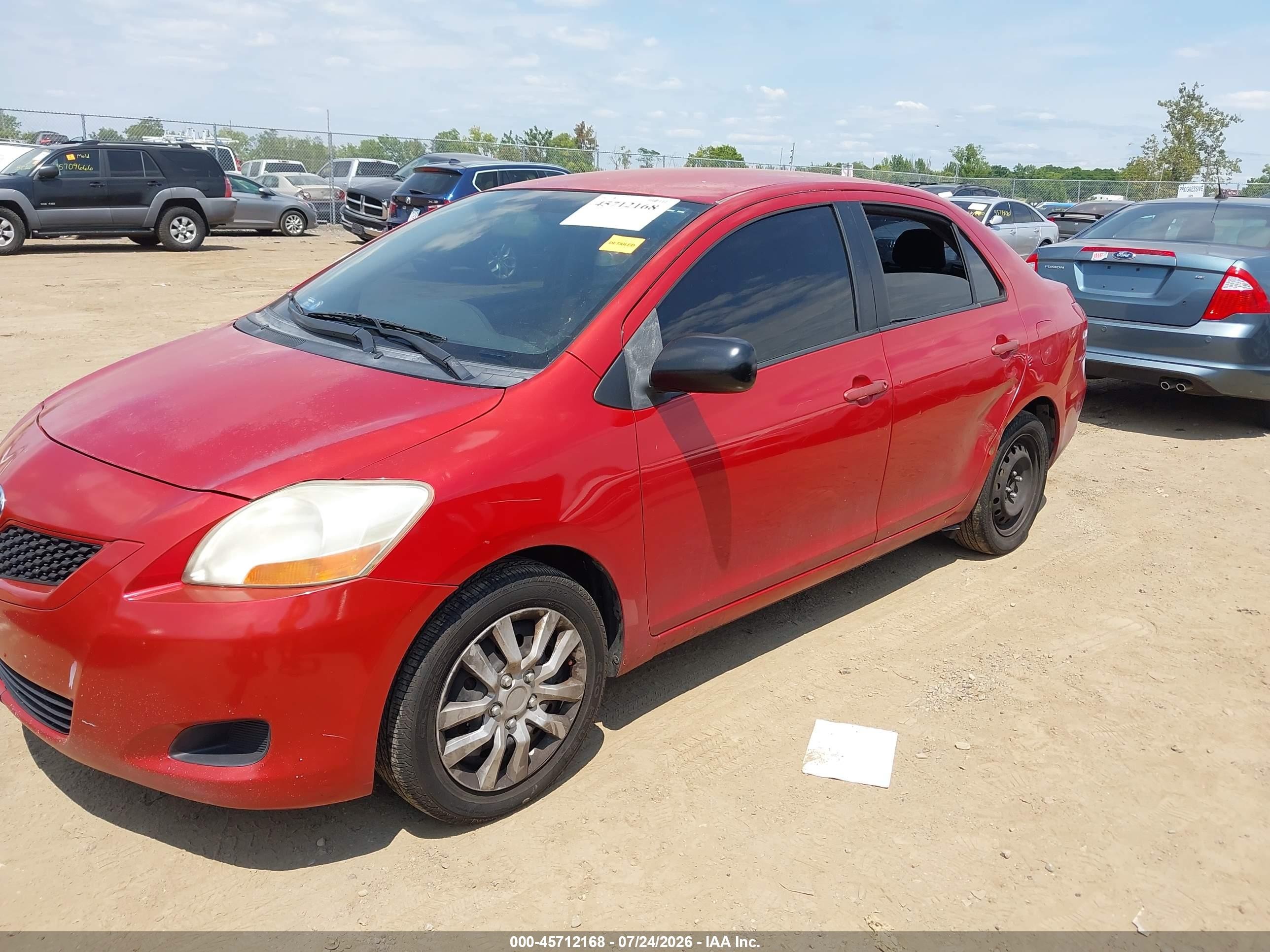 2011 Toyota Yaris Red vin: JTDBT4K3XB1402331
