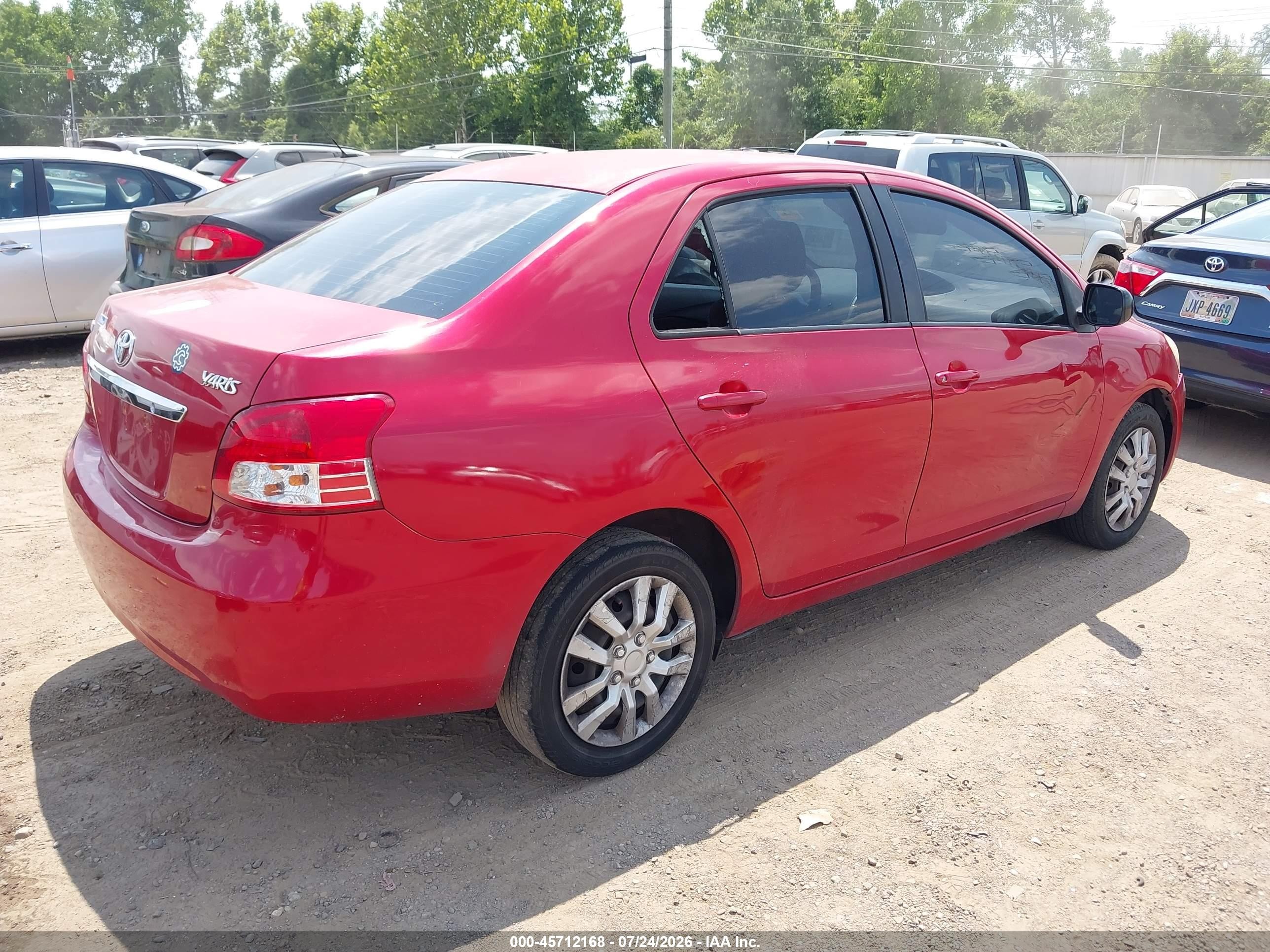 2011 Toyota Yaris Red vin: JTDBT4K3XB1402331