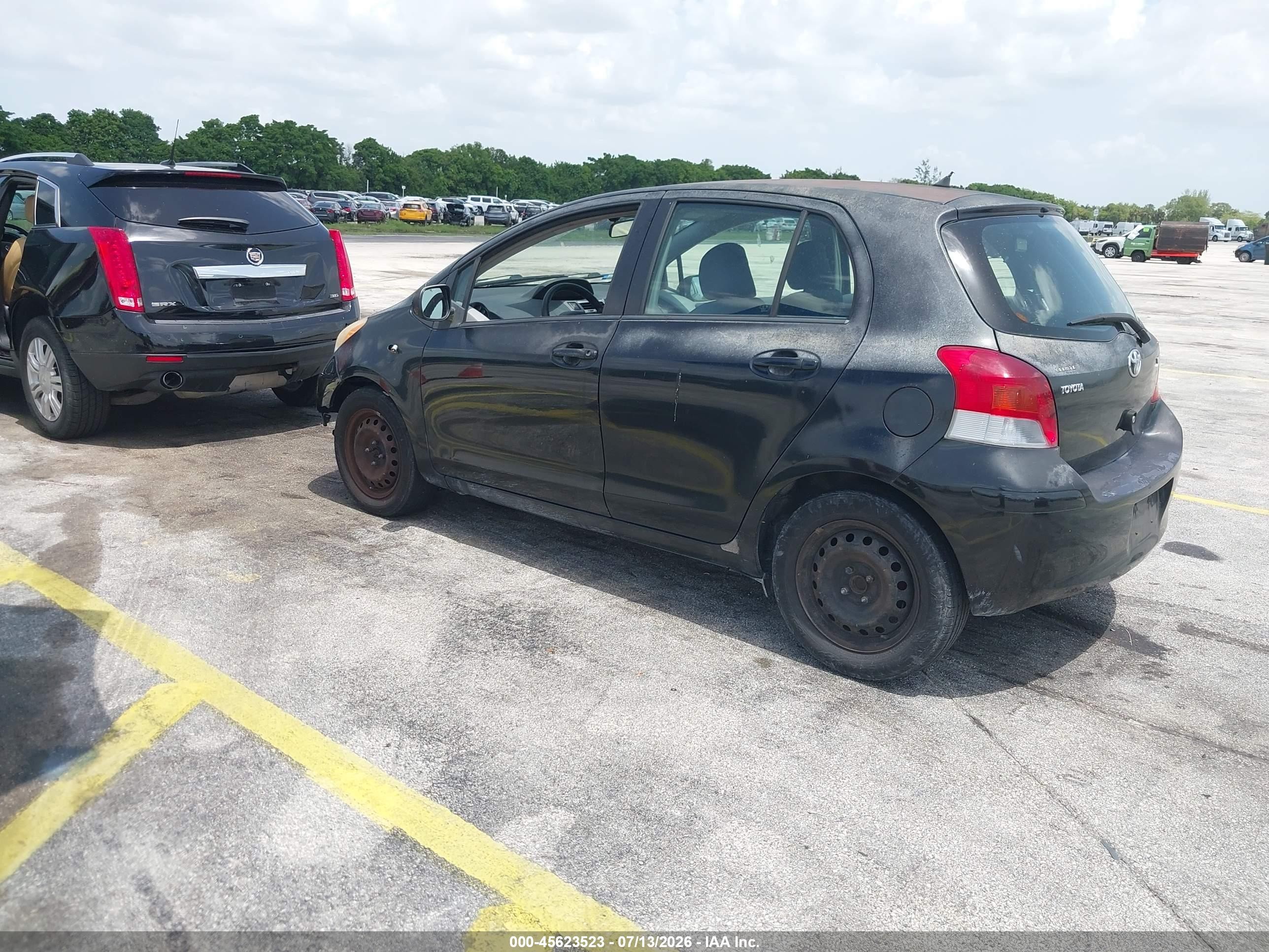 2009 Toyota Yaris   Black vin: JTDBT903091305214