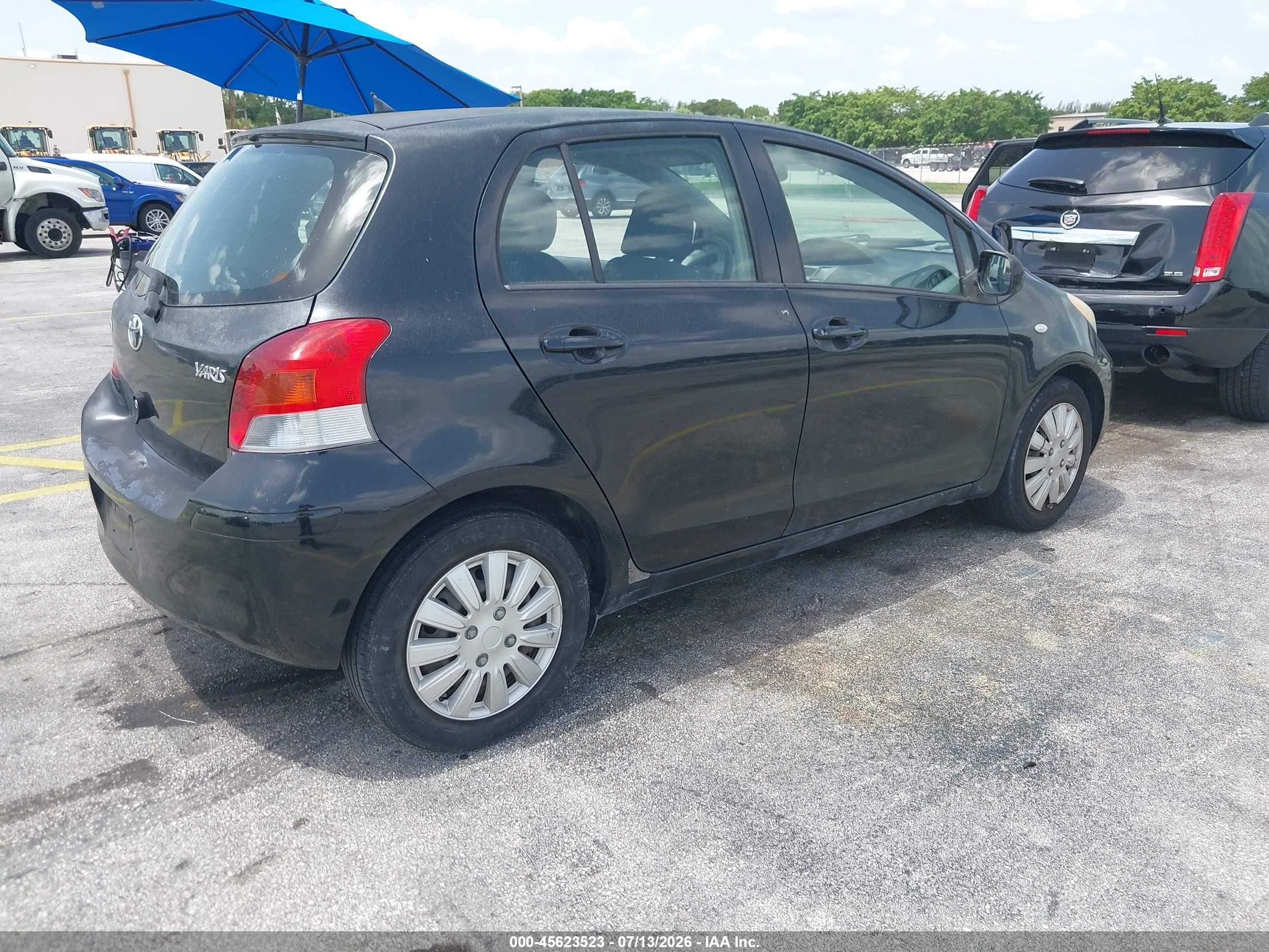 2009 Toyota Yaris   Black vin: JTDBT903091305214
