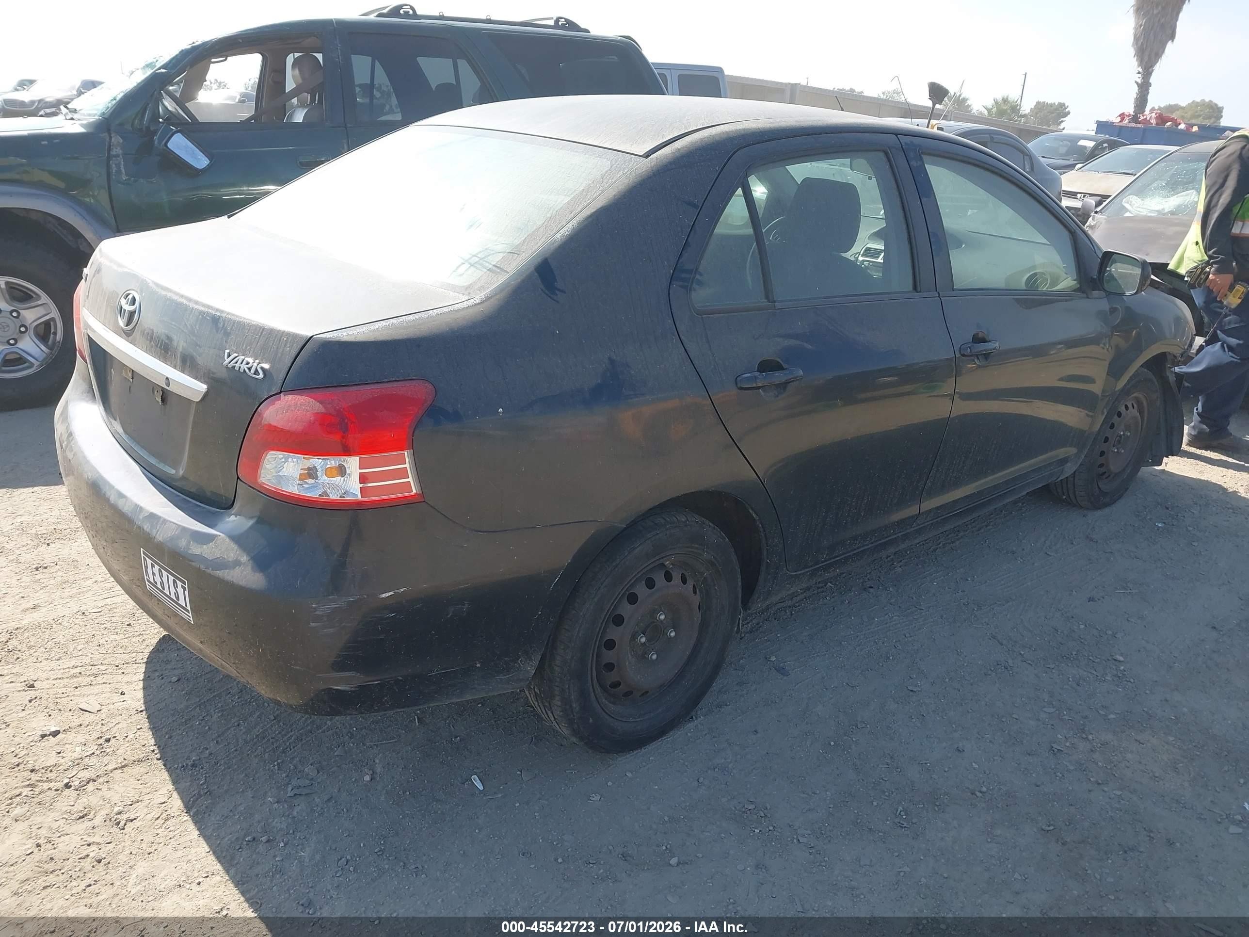 2009 Toyota Yaris   Black vin: JTDBT903091317671