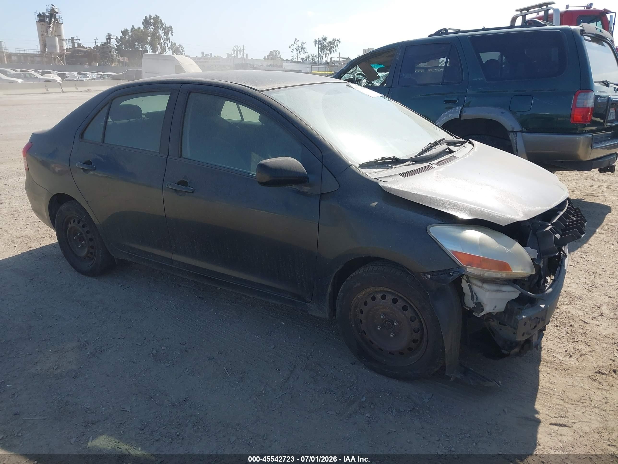 2009 Toyota Yaris   Black vin: JTDBT903091317671