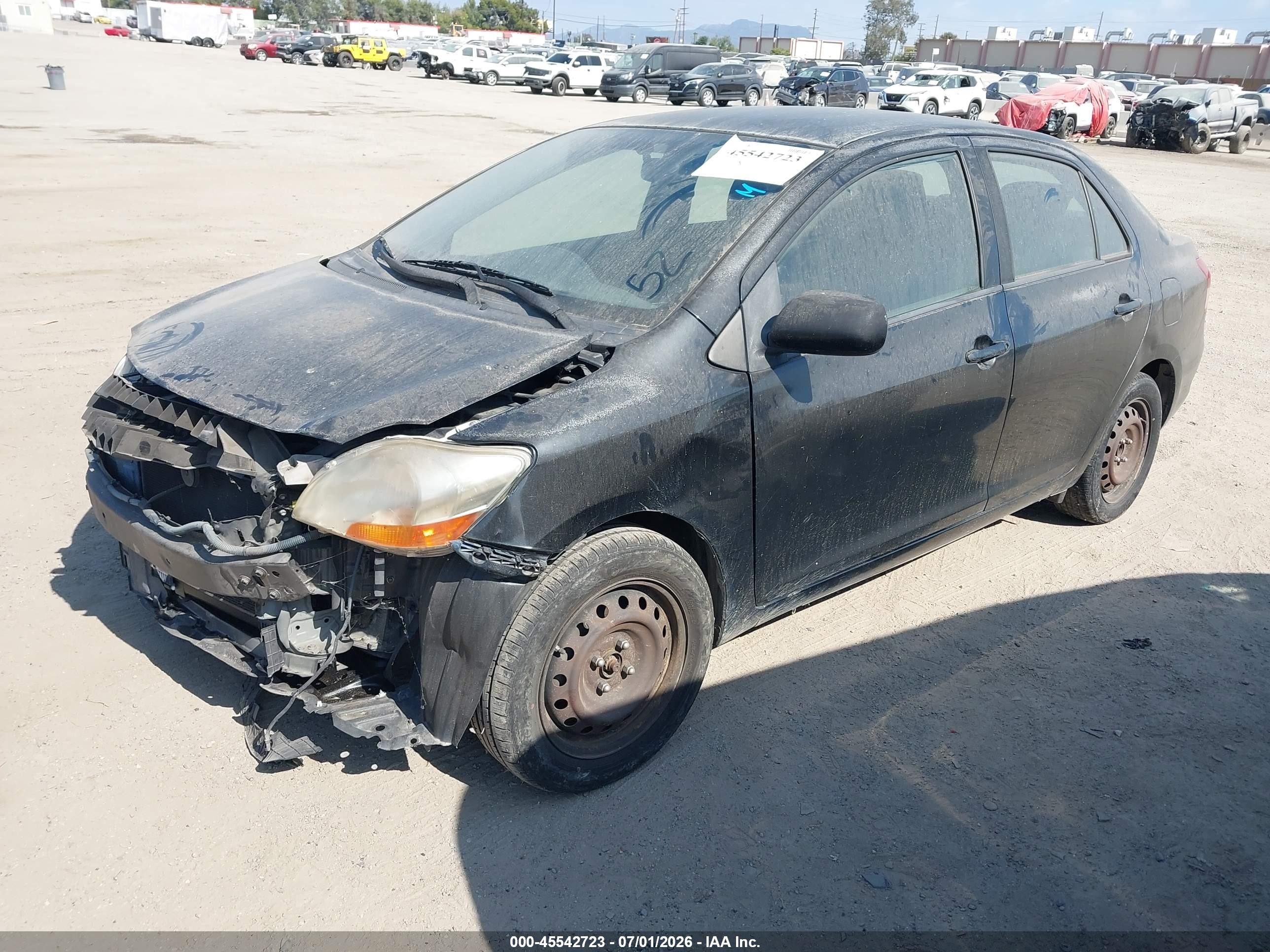 2009 Toyota Yaris   Black vin: JTDBT903091317671