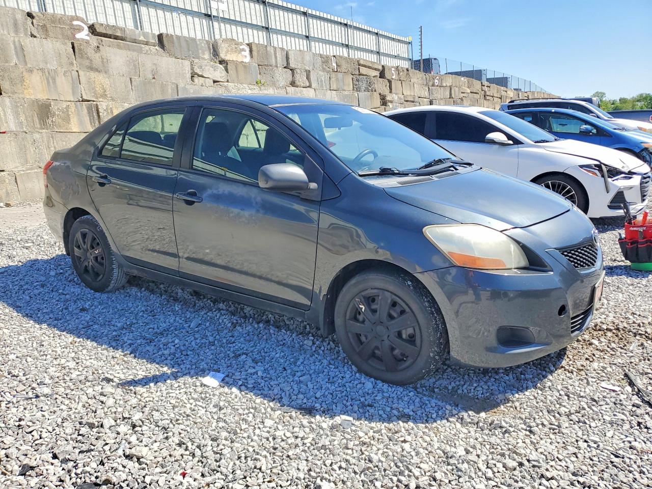 2009 Toyota Yaris Base Gray vin: JTDBT903091323731