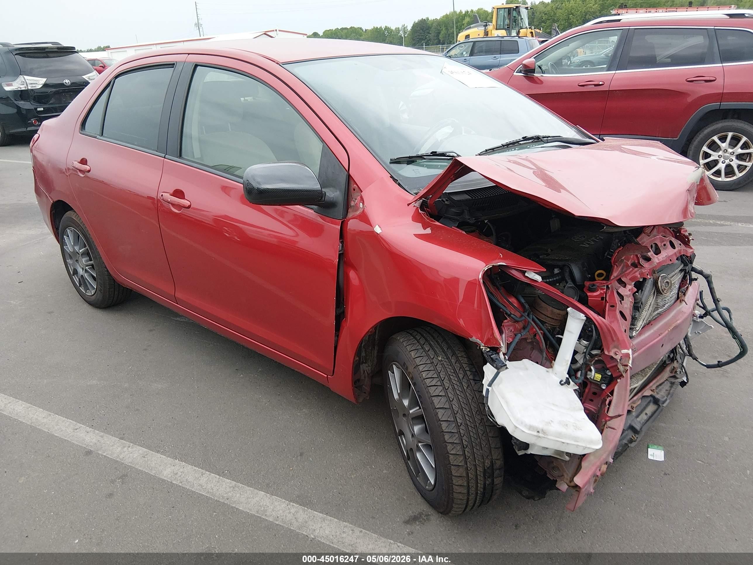 2009 Toyota Yaris   Red vin: JTDBT903094048764
