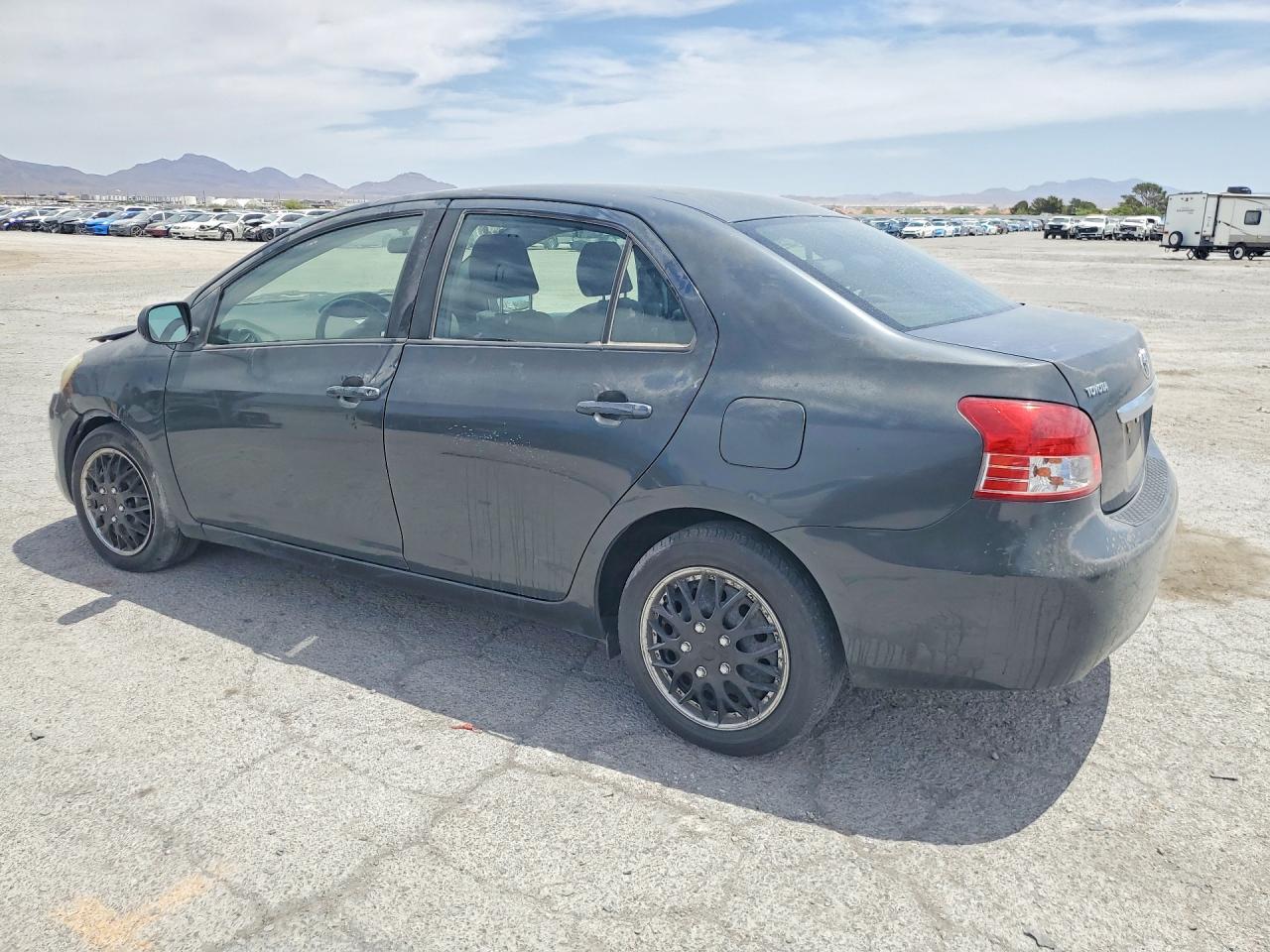 2009 Toyota Yaris Base Charcoal vin: JTDBT903391301075